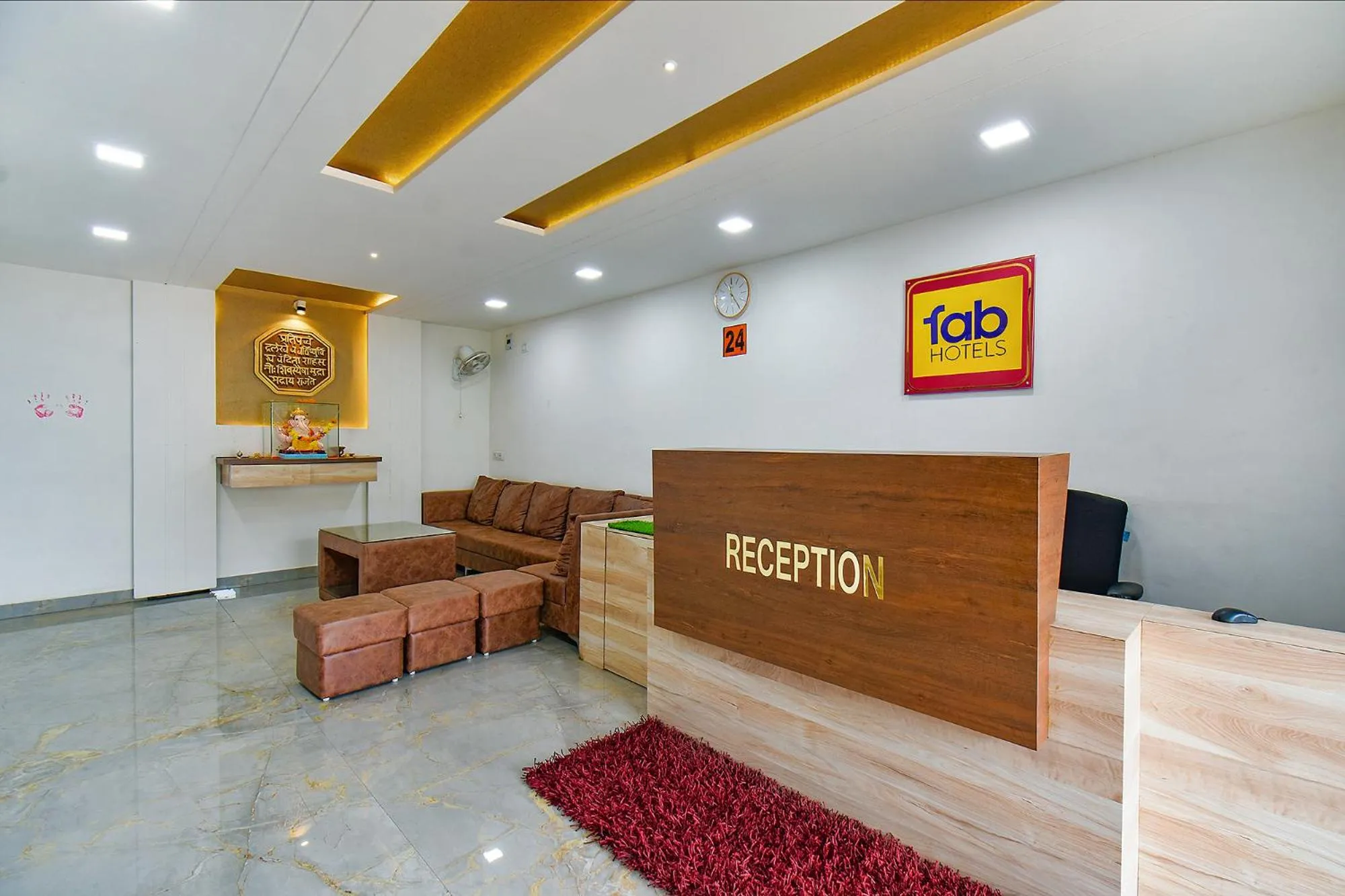 Lobby or reception in FabHotel Tiru Residency