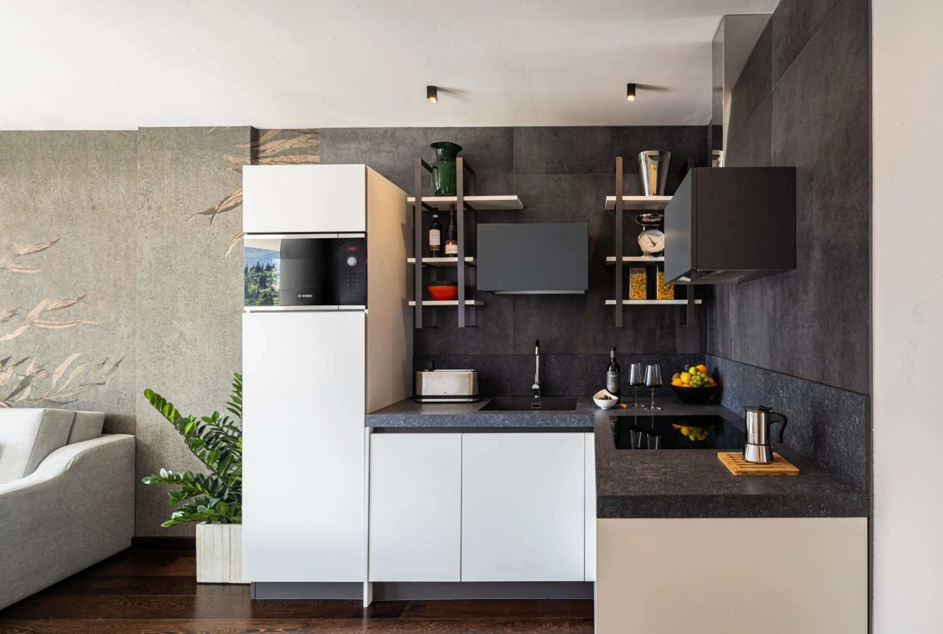 Kitchen or kitchenette in Aris Apartments & Sky Pool - Tonelli Hotels - Adult Friendly