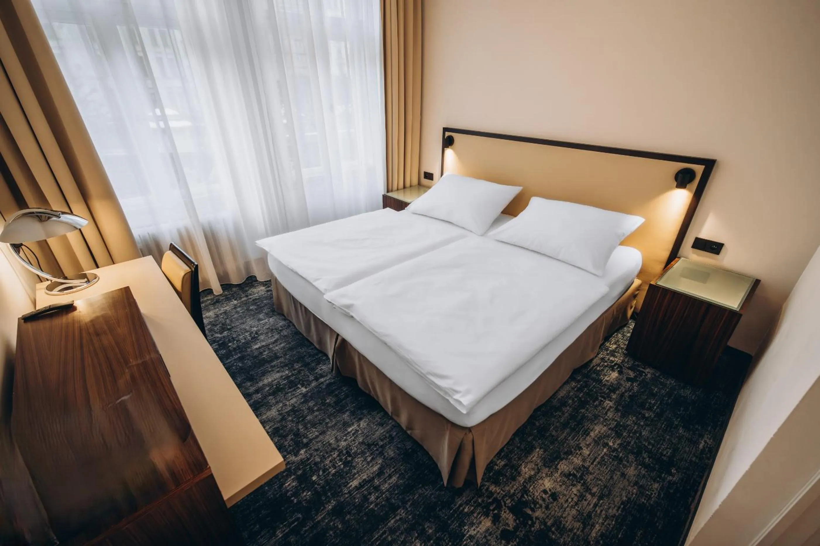 Bed in Esplanade Self Check-in Hotel