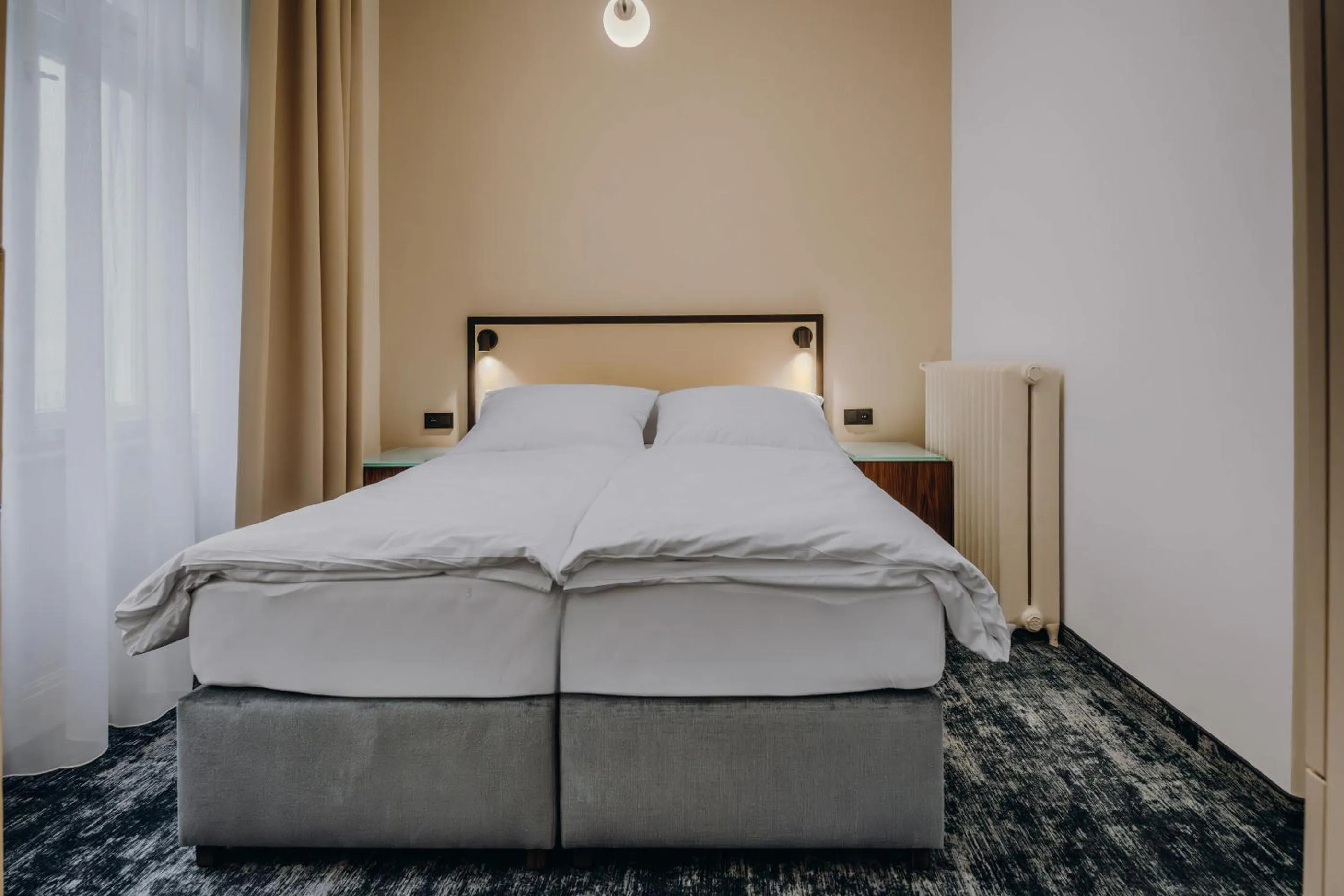 Bed in Esplanade Self Check-in Hotel