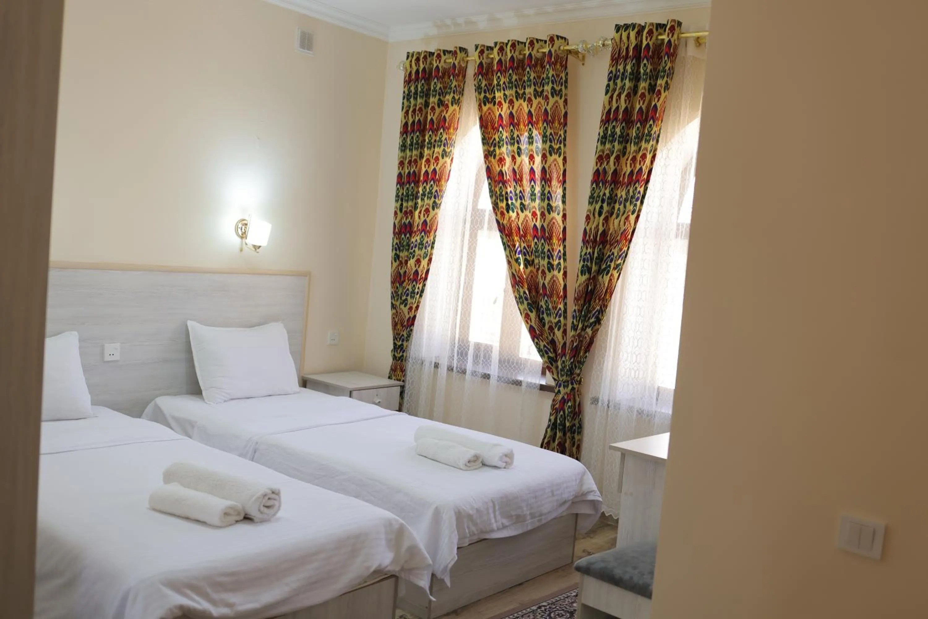 Bed in Sultanat Hotel