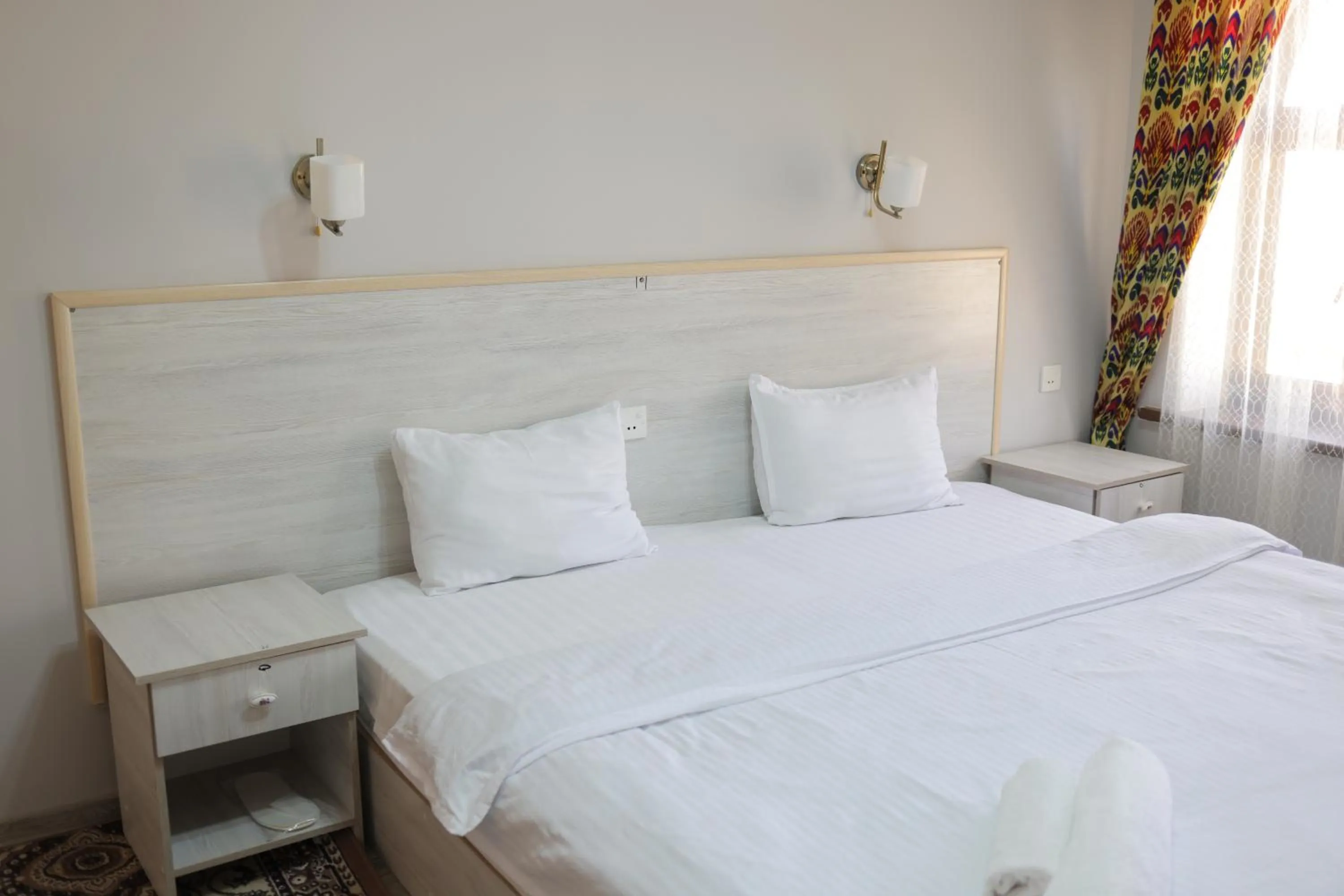 Bed in Sultanat Hotel