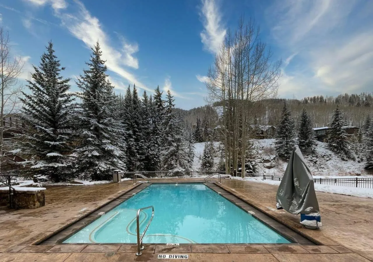 Swimming pool in Lion Square Lodge Condos by TO