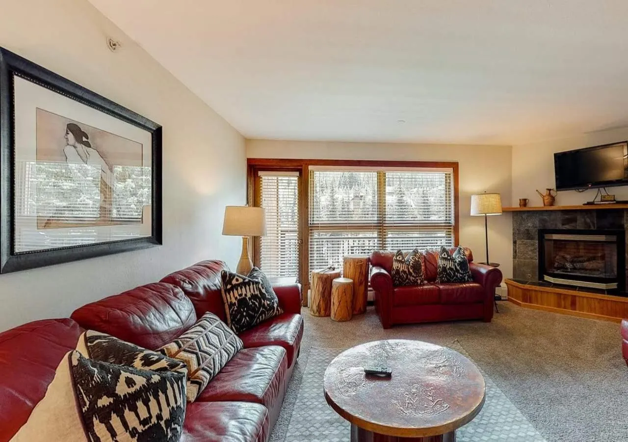 Living room in Lion Square Lodge Condos by TO