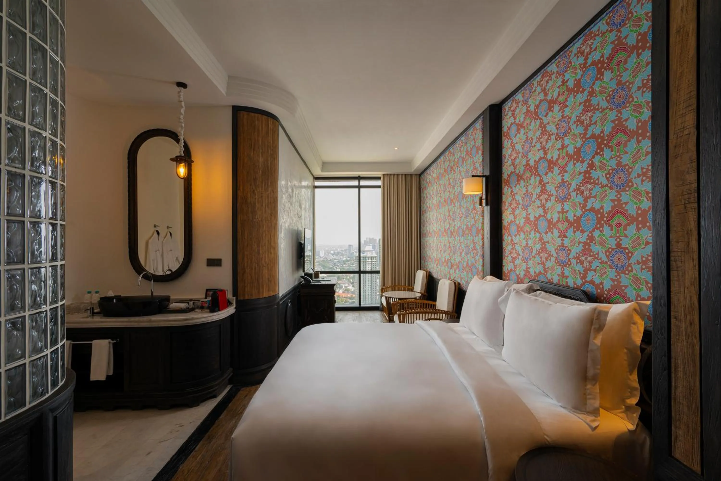 Bed in The Orient Jakarta, a Royal Hideaway Hotel