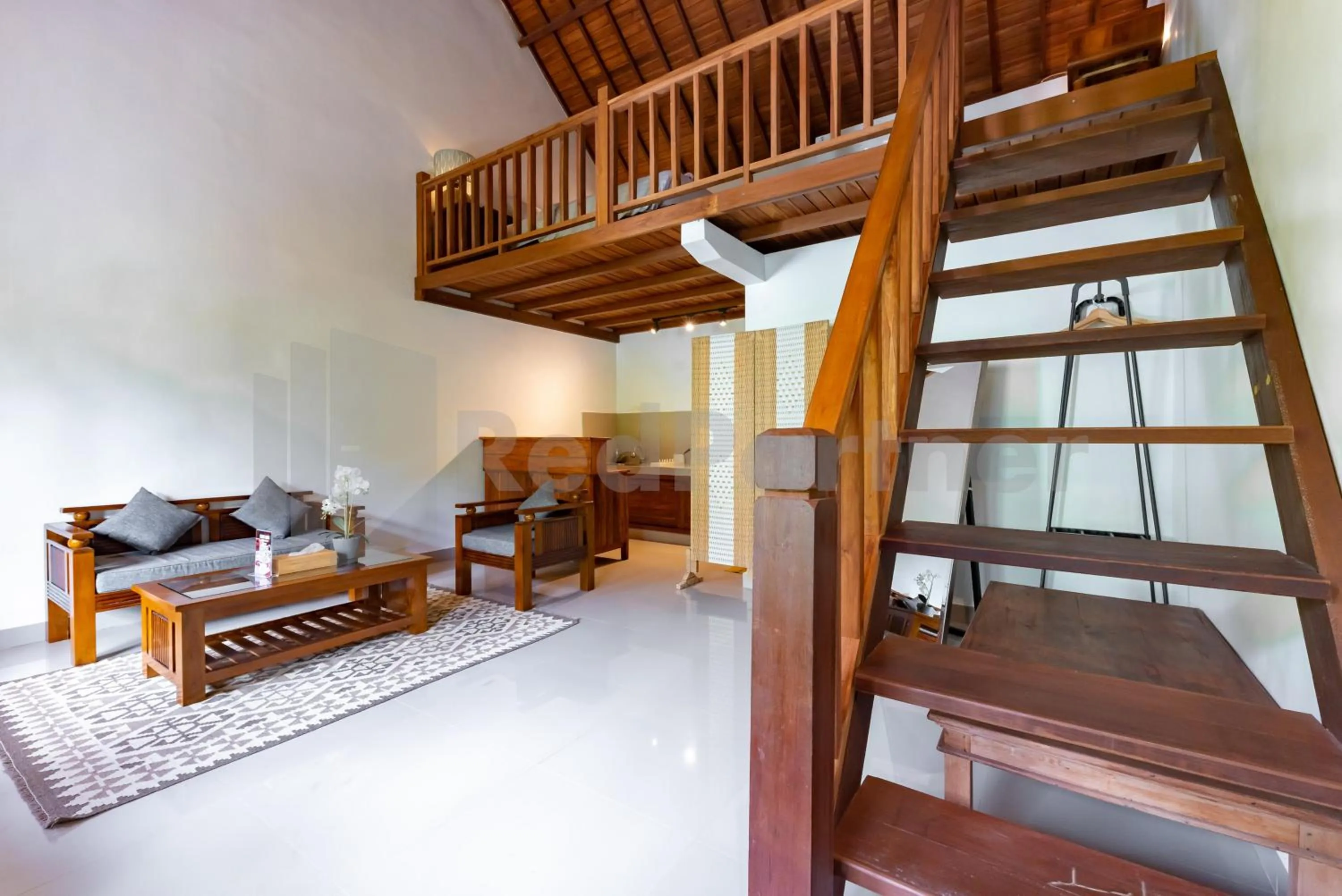 Seating area in Brisk Homestay Uluwatu RedPartner