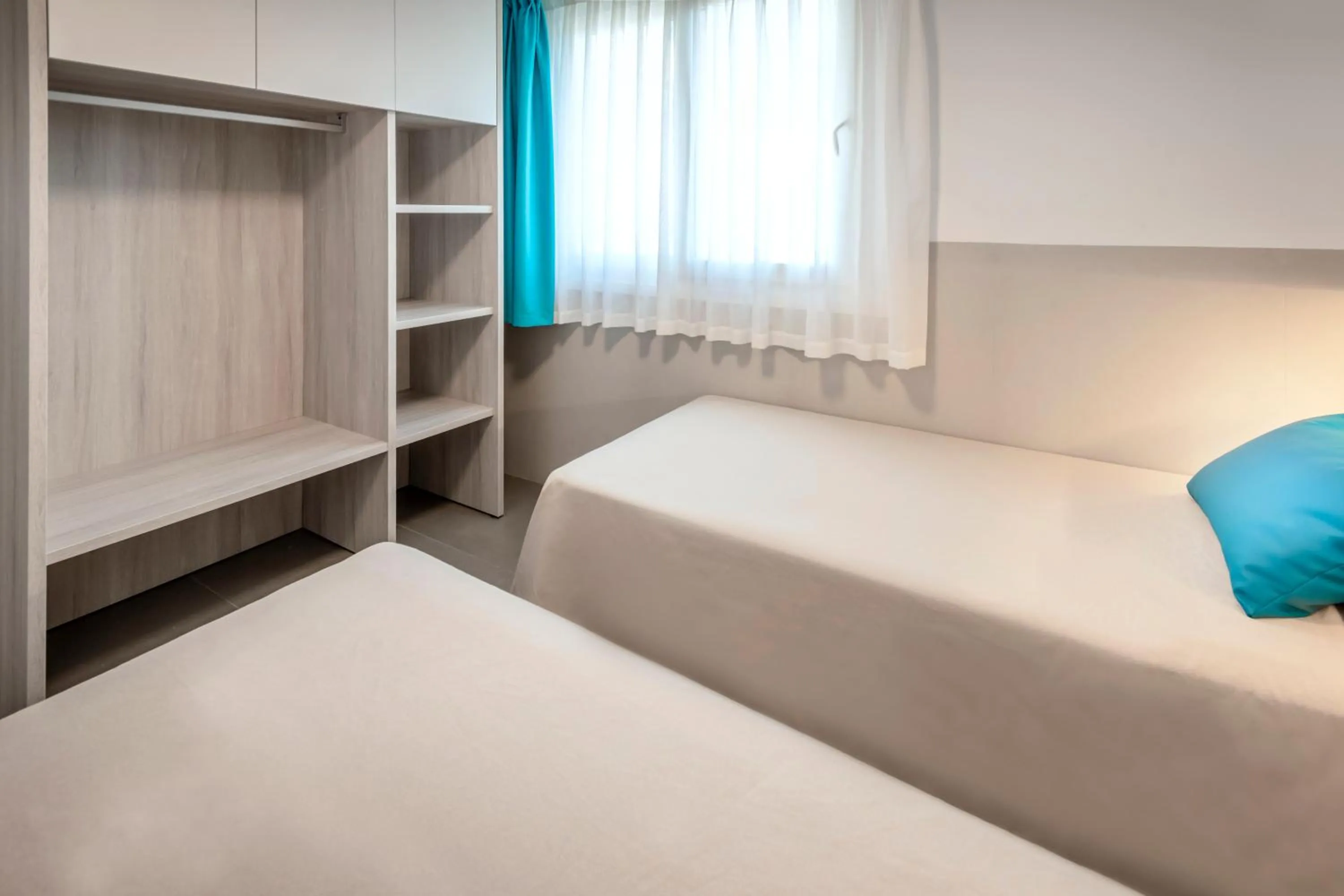 Bedroom, Bed in Rentalmar Salou Playa Family Suites & Pool