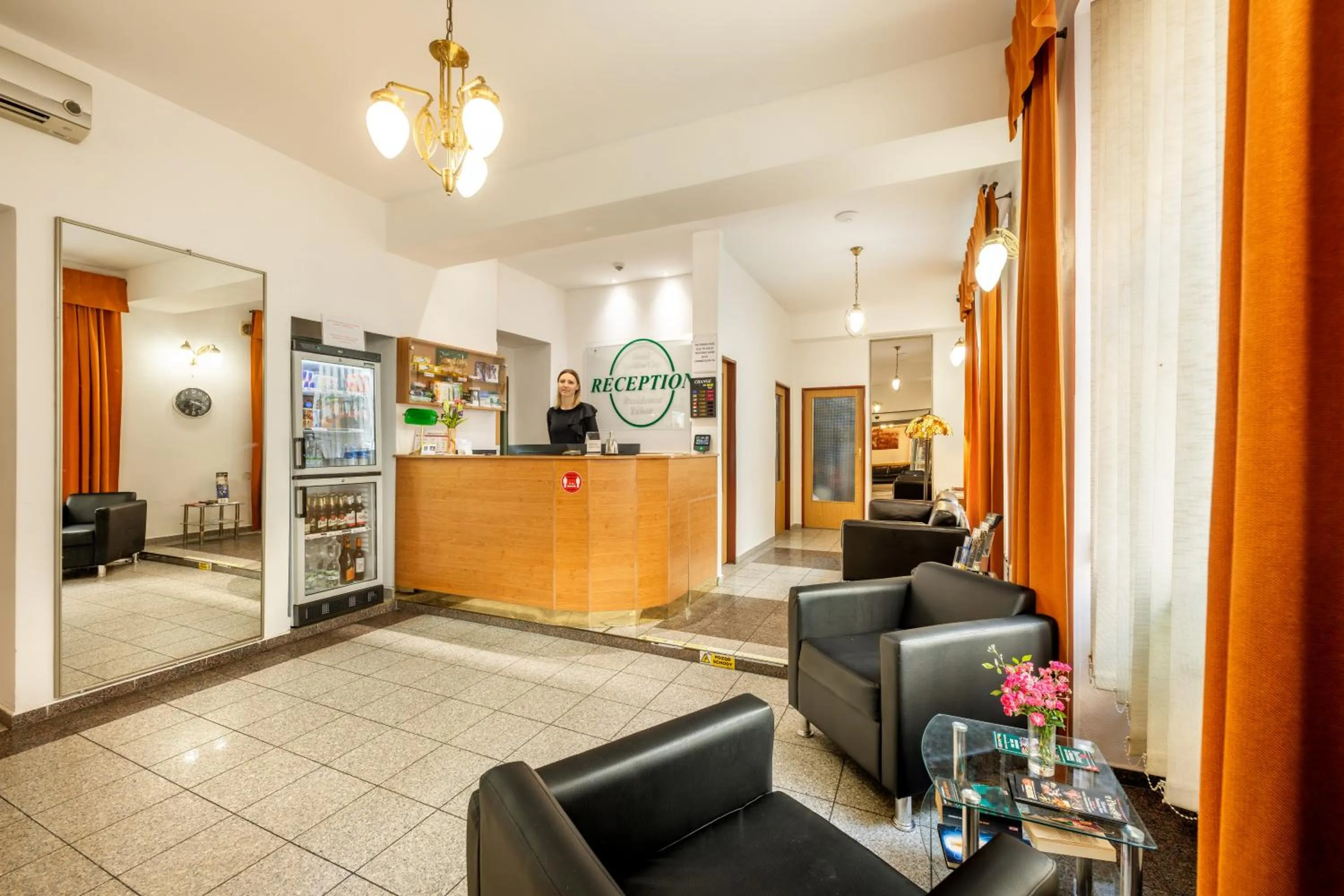 Lobby or reception in Hotel Golden City Garni