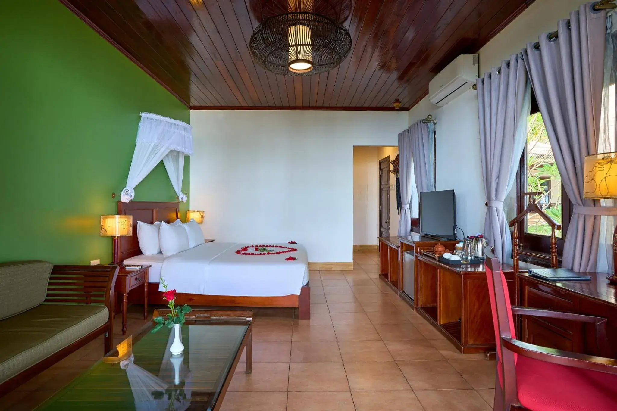 Communal lounge/ TV room, Bed in Lang Co Beach Resort Communal lounge/ TV room, Bed in Lang Co Beach Resort