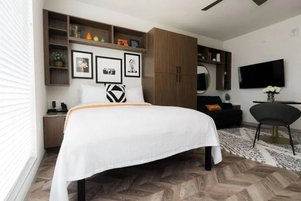 Bed in Yugo Guest Suites