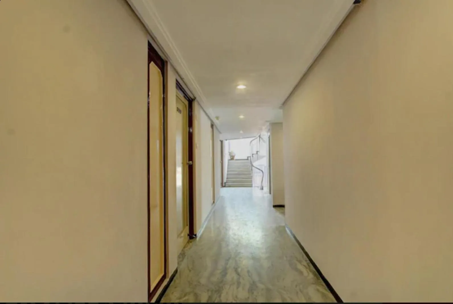 Communal lounge/ TV room in Padmam Hotel