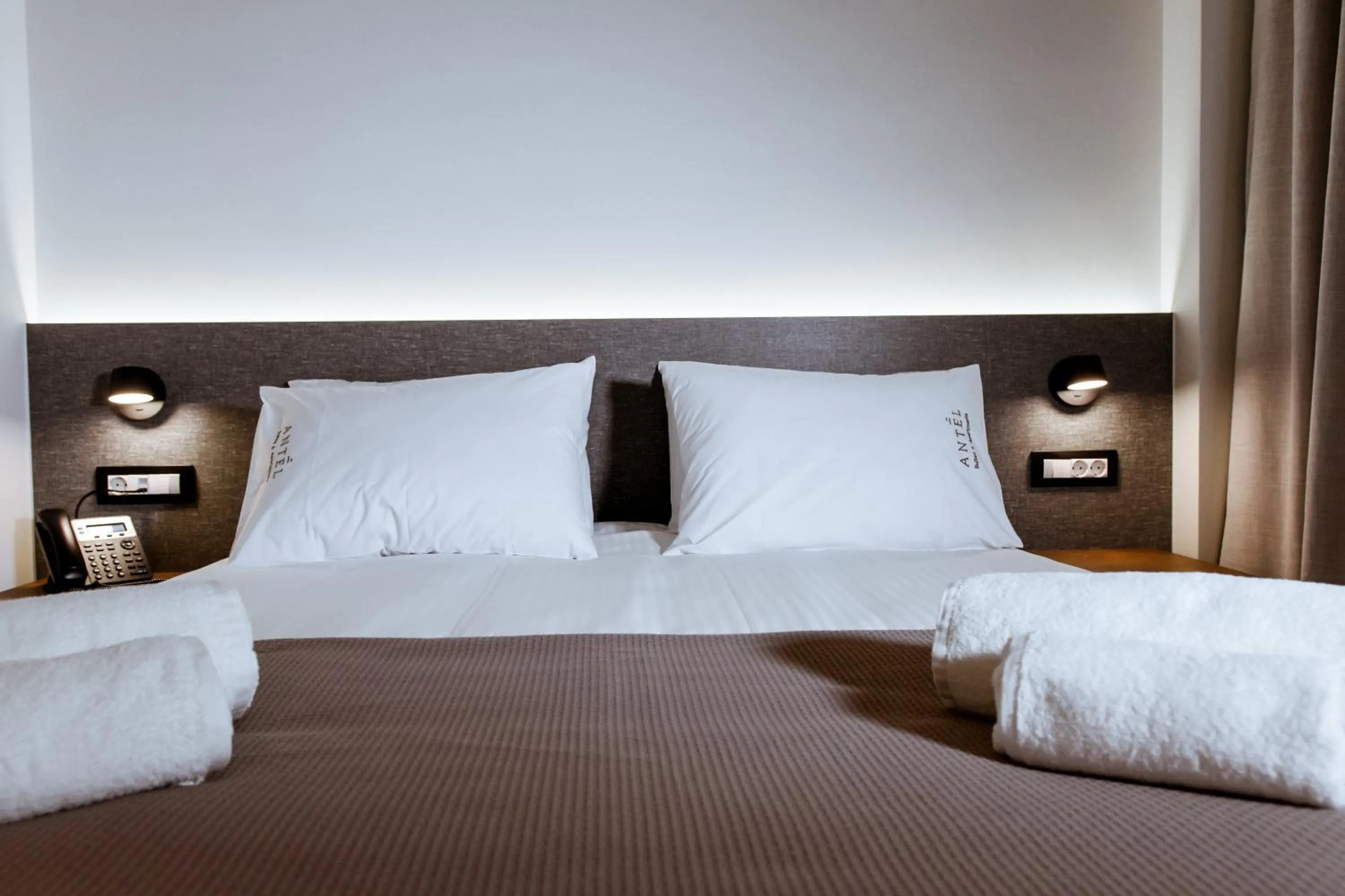 Bed in ANTEL Suites & Apartments