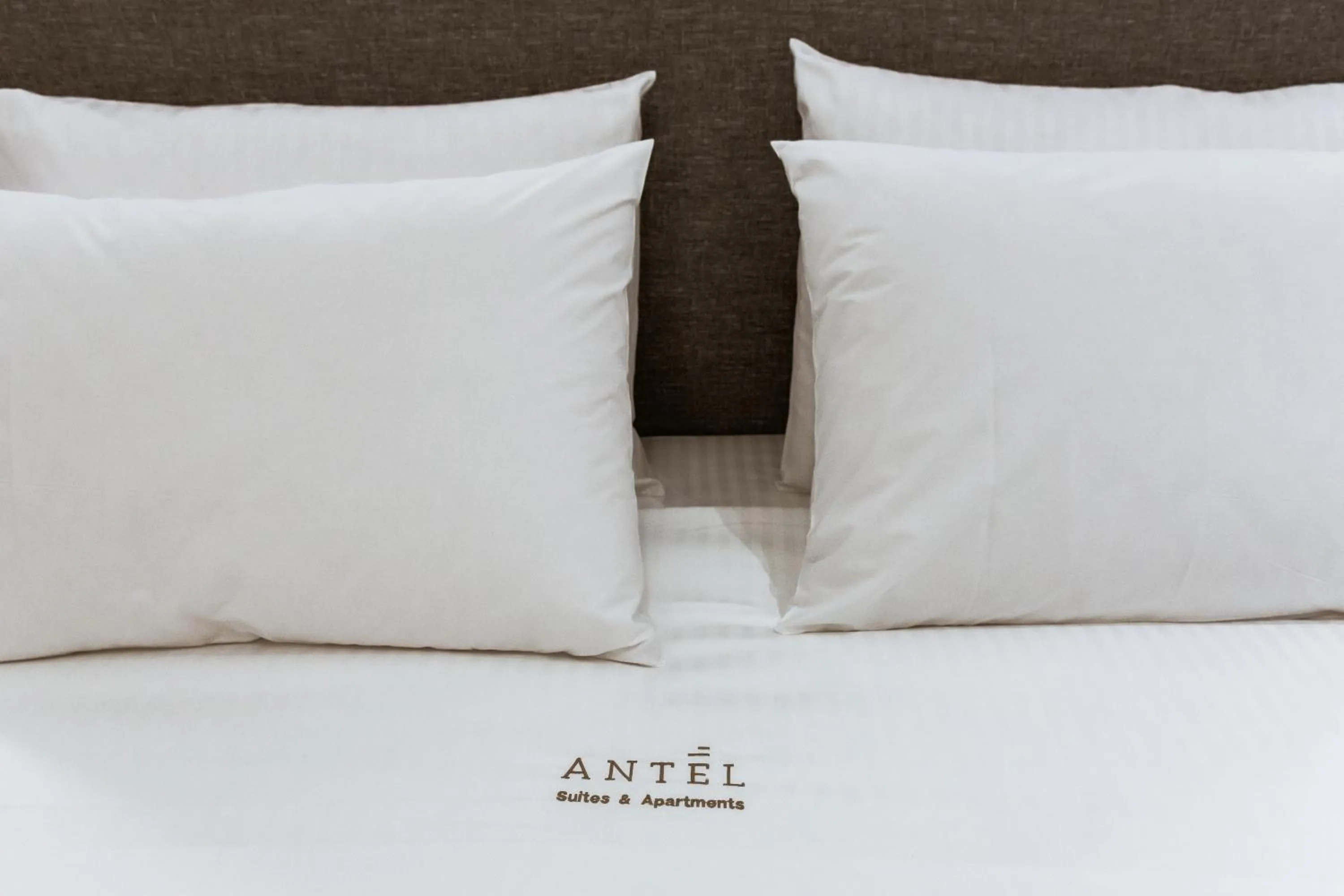 Bed in ANTEL Suites & Apartments