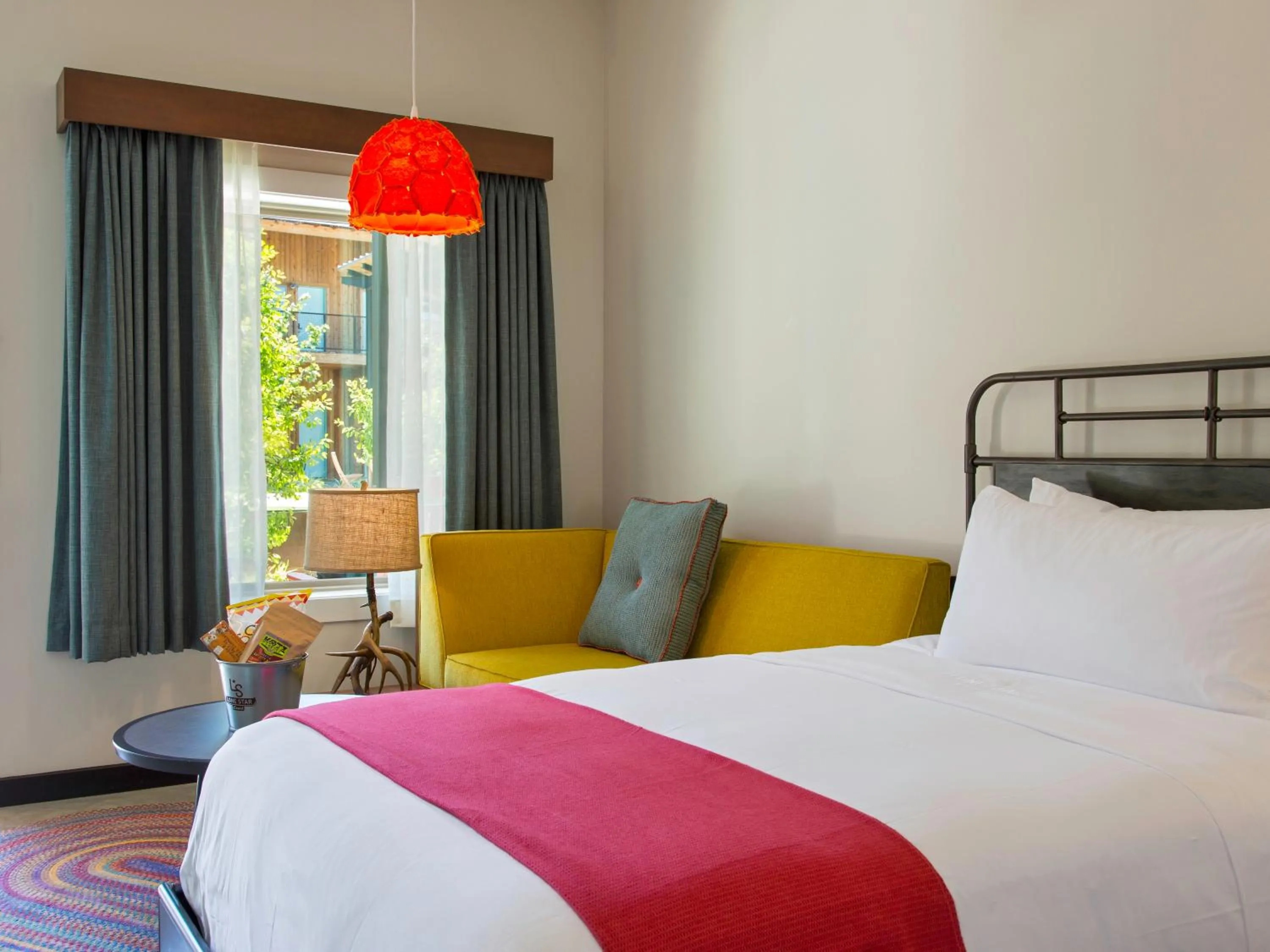 Bed in Lone Star Court, by Valencia Hotel Collection