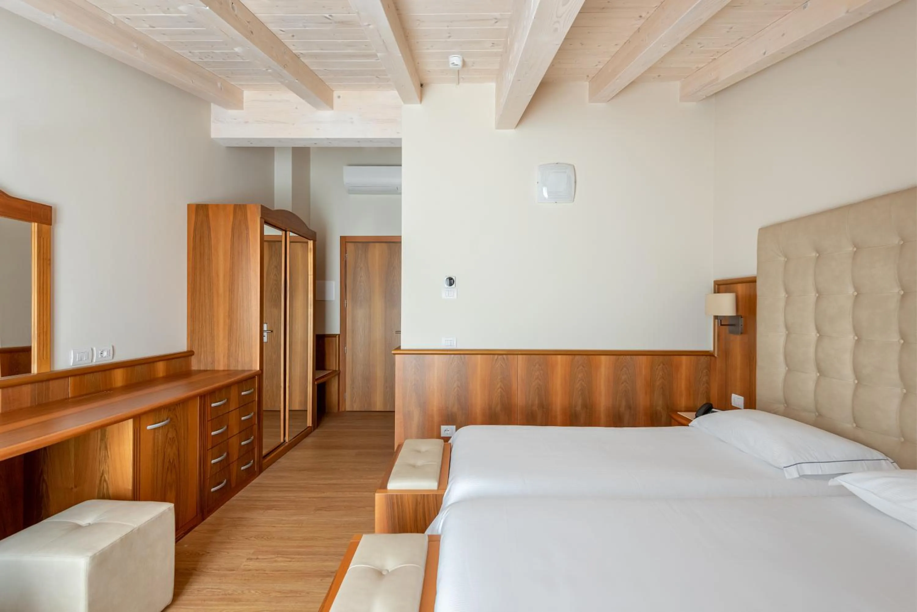 Bed in Hotel Palme & Suite