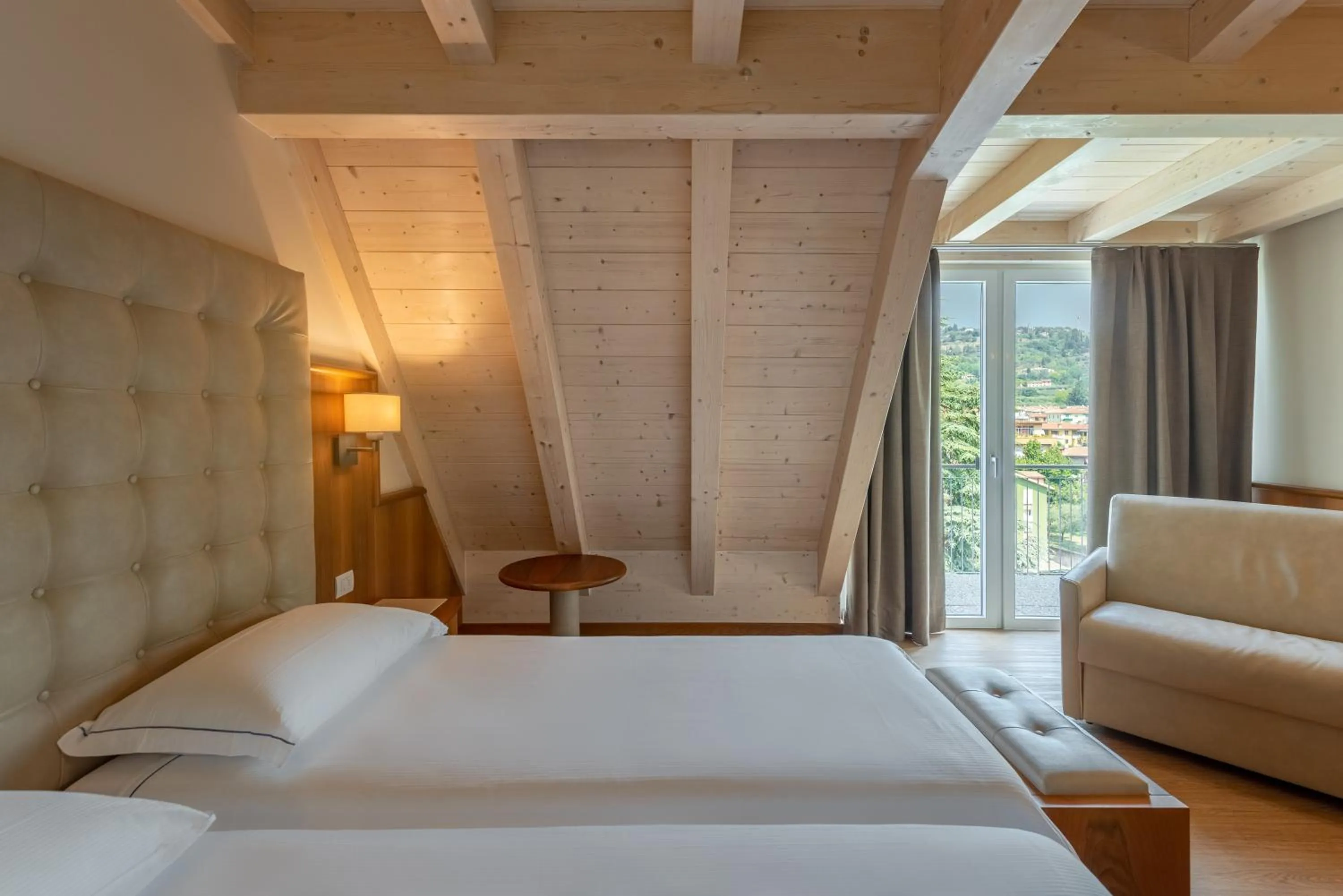 Bed in Hotel Palme & Suite