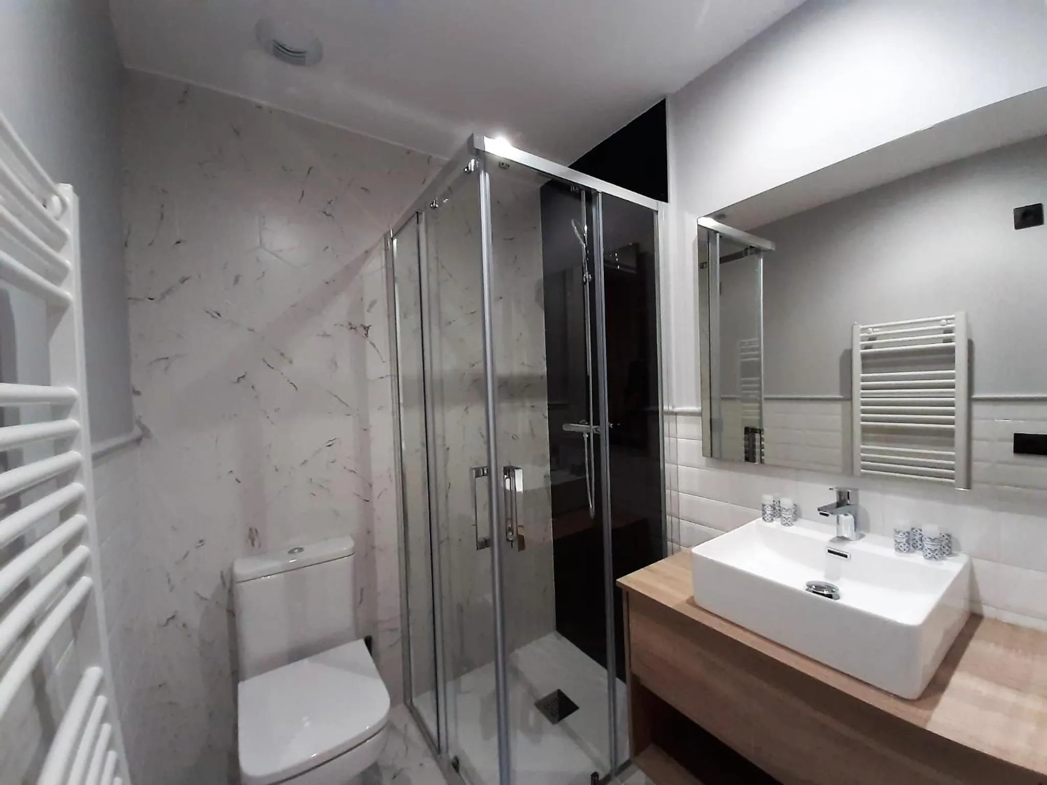 Shower in Apartamentos Celestina by gaiarooms