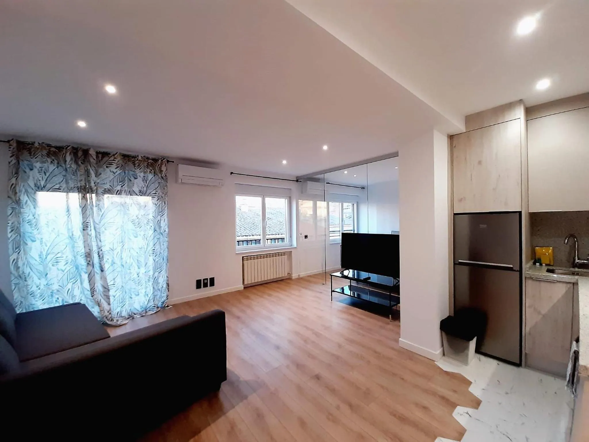 Kitchen or kitchenette in Apartamentos Celestina by gaiarooms