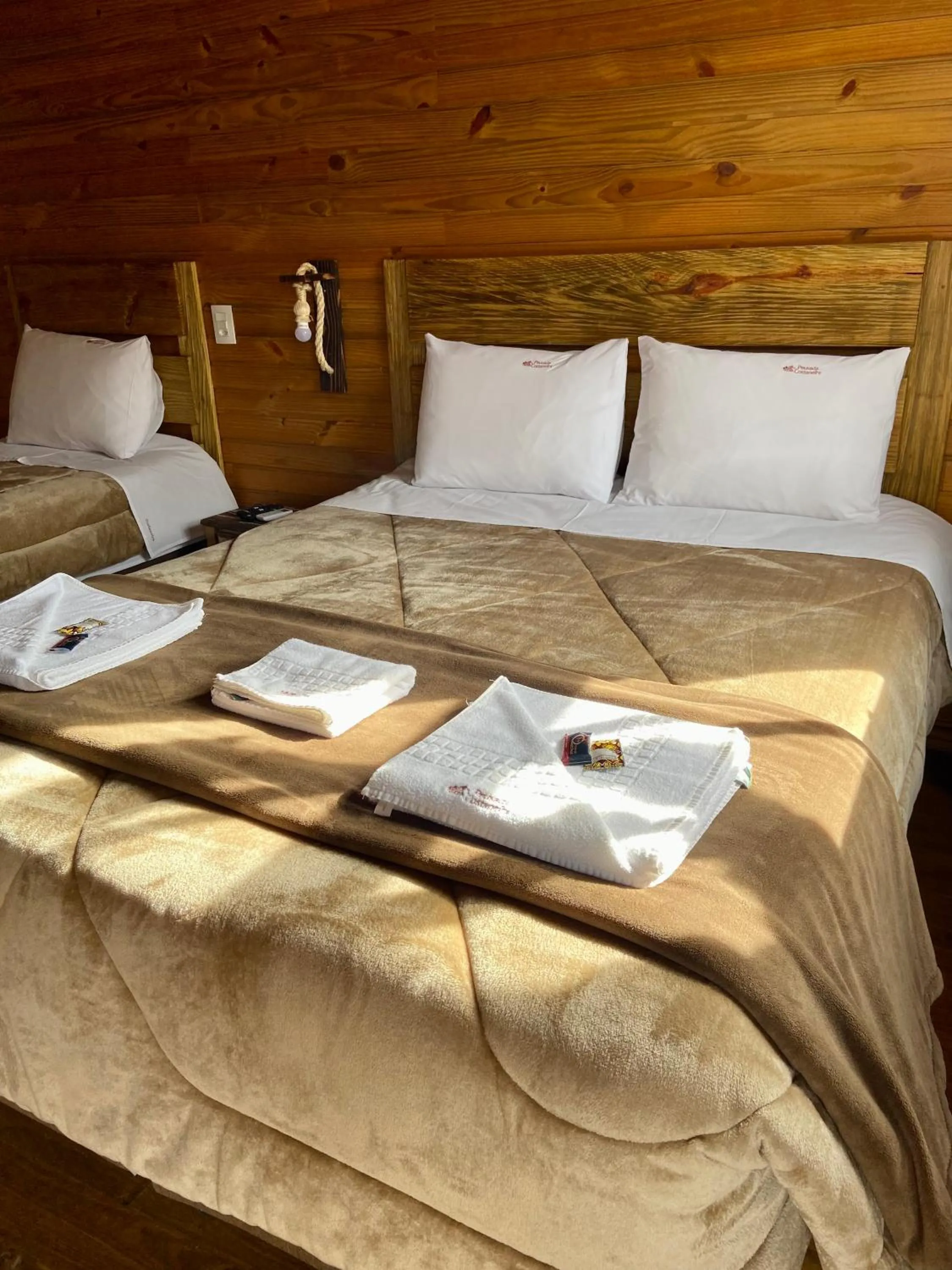 Bed in Pousada Costaneira