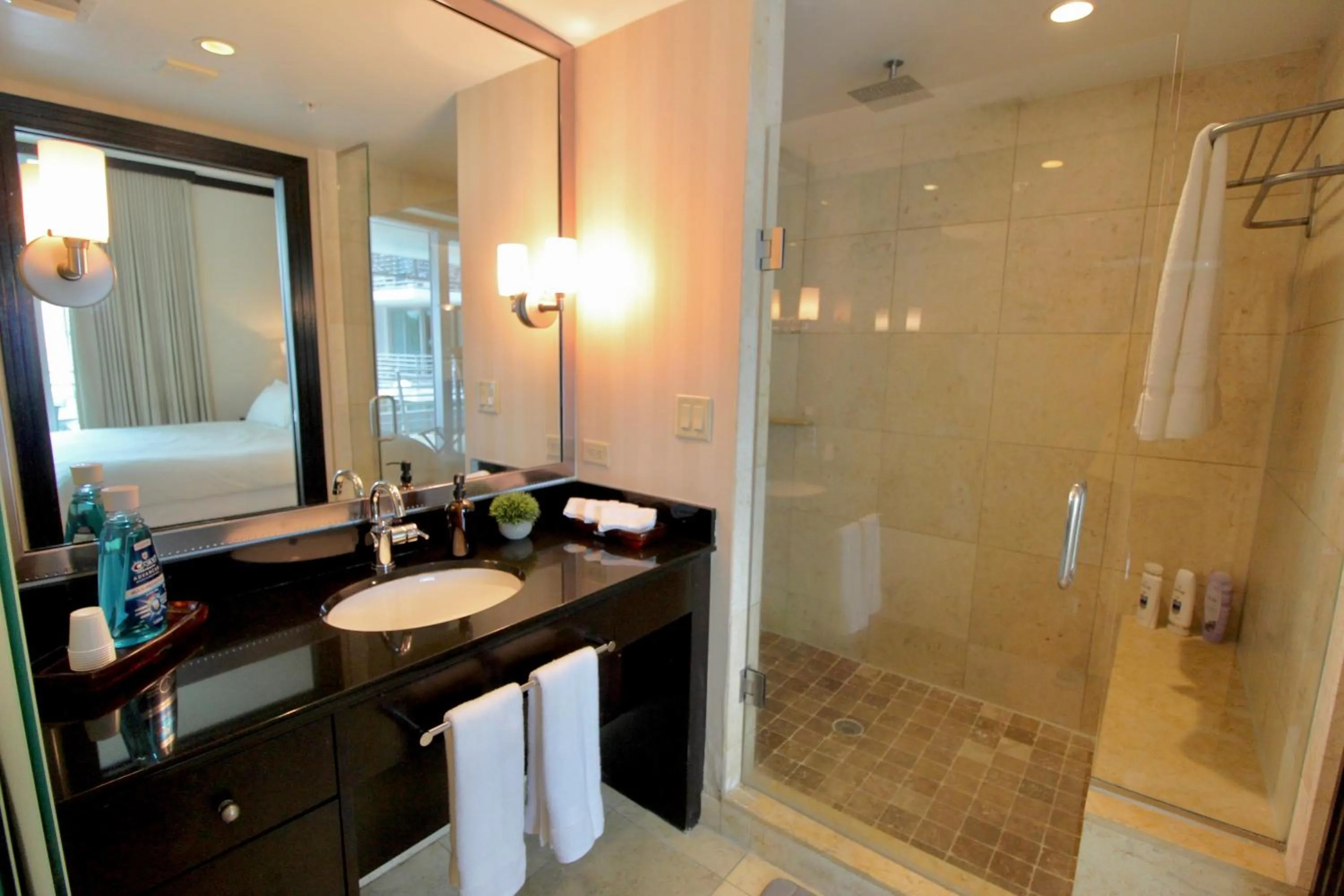Shower in Boutique Suites 3 min walk to beach