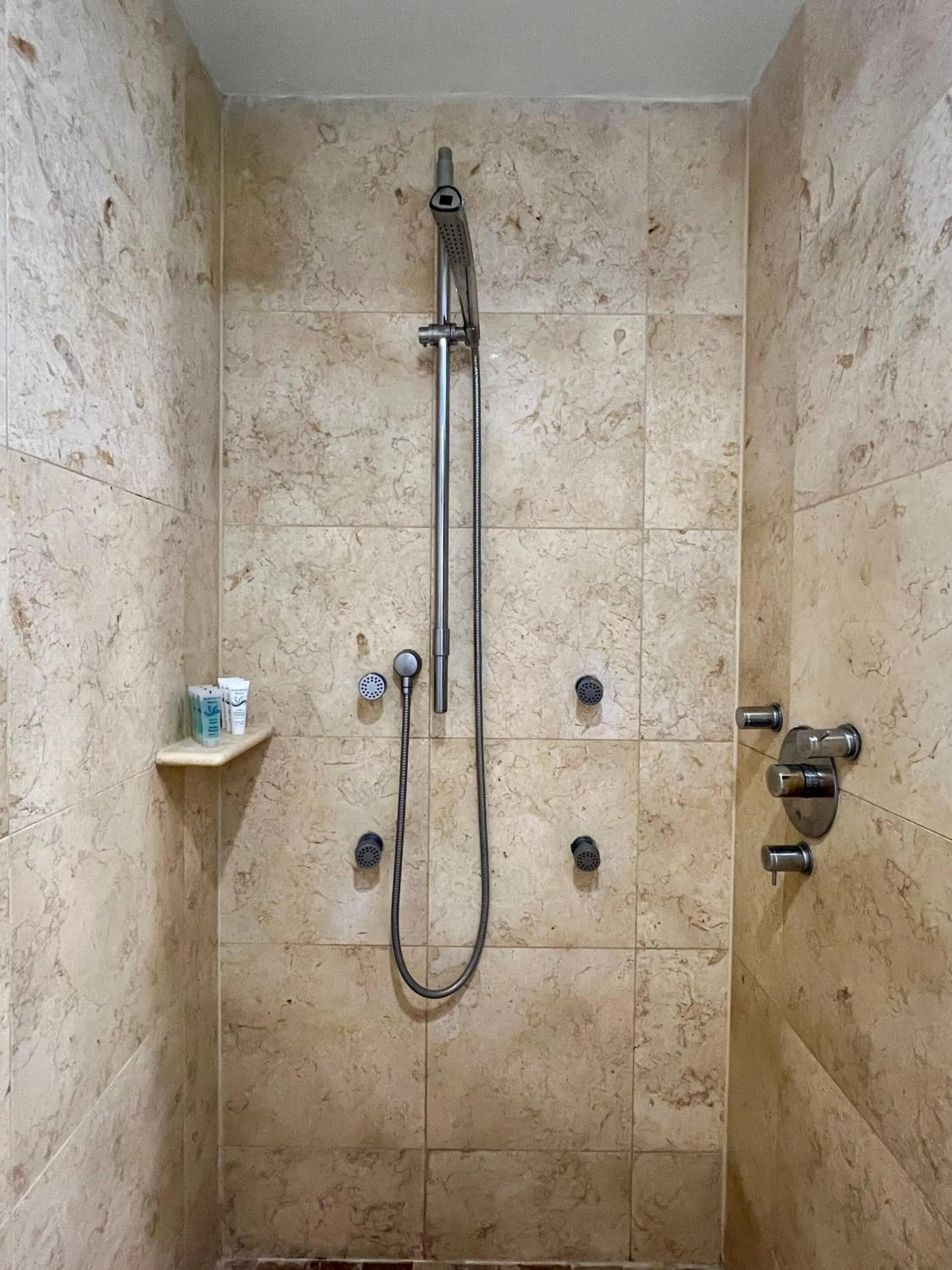 Shower in Boutique Suites 3 min walk to beach
