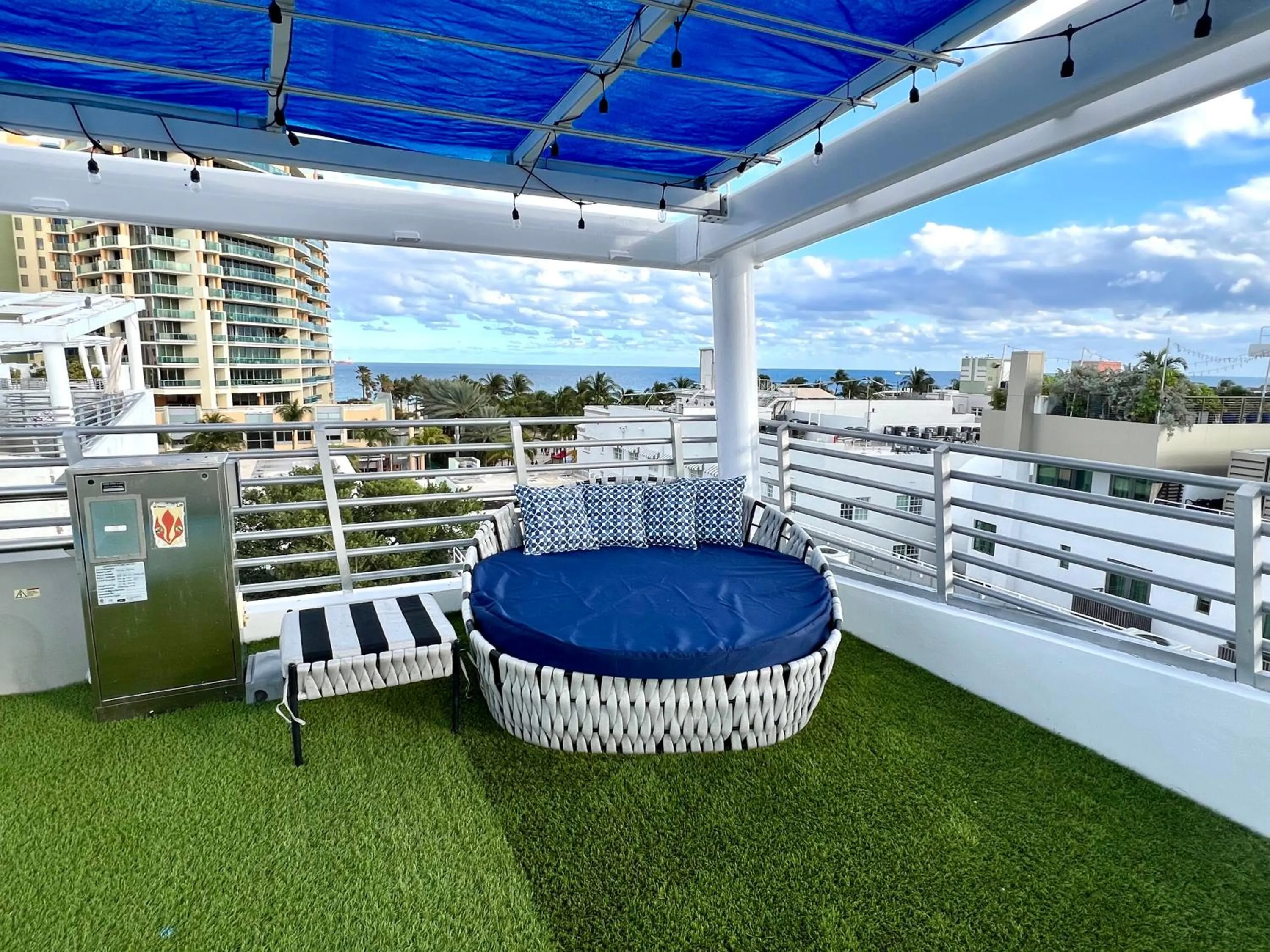 Patio in Boutique Suites 3 min walk to beach