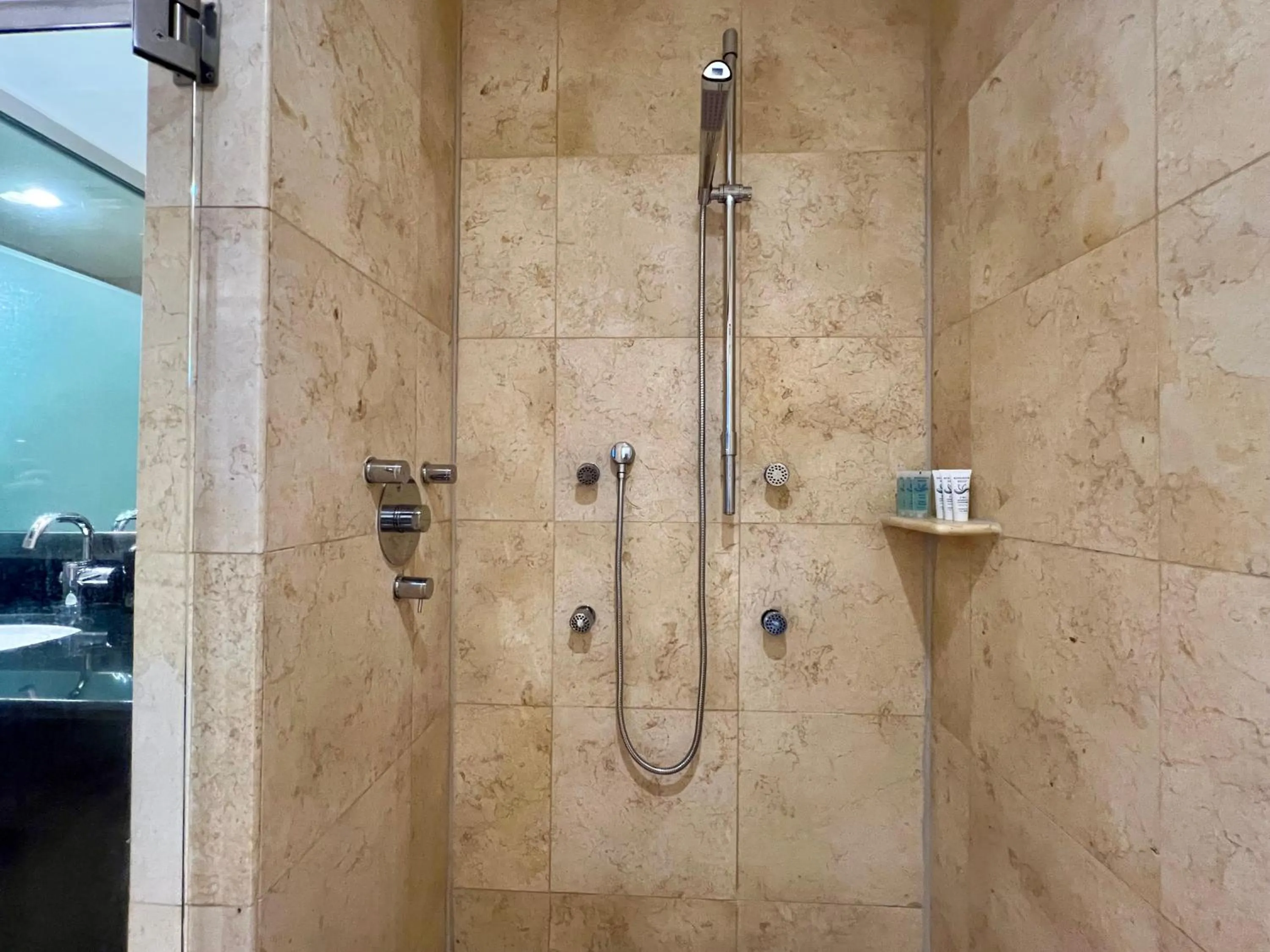 Shower in Boutique Suites 3 min walk to beach