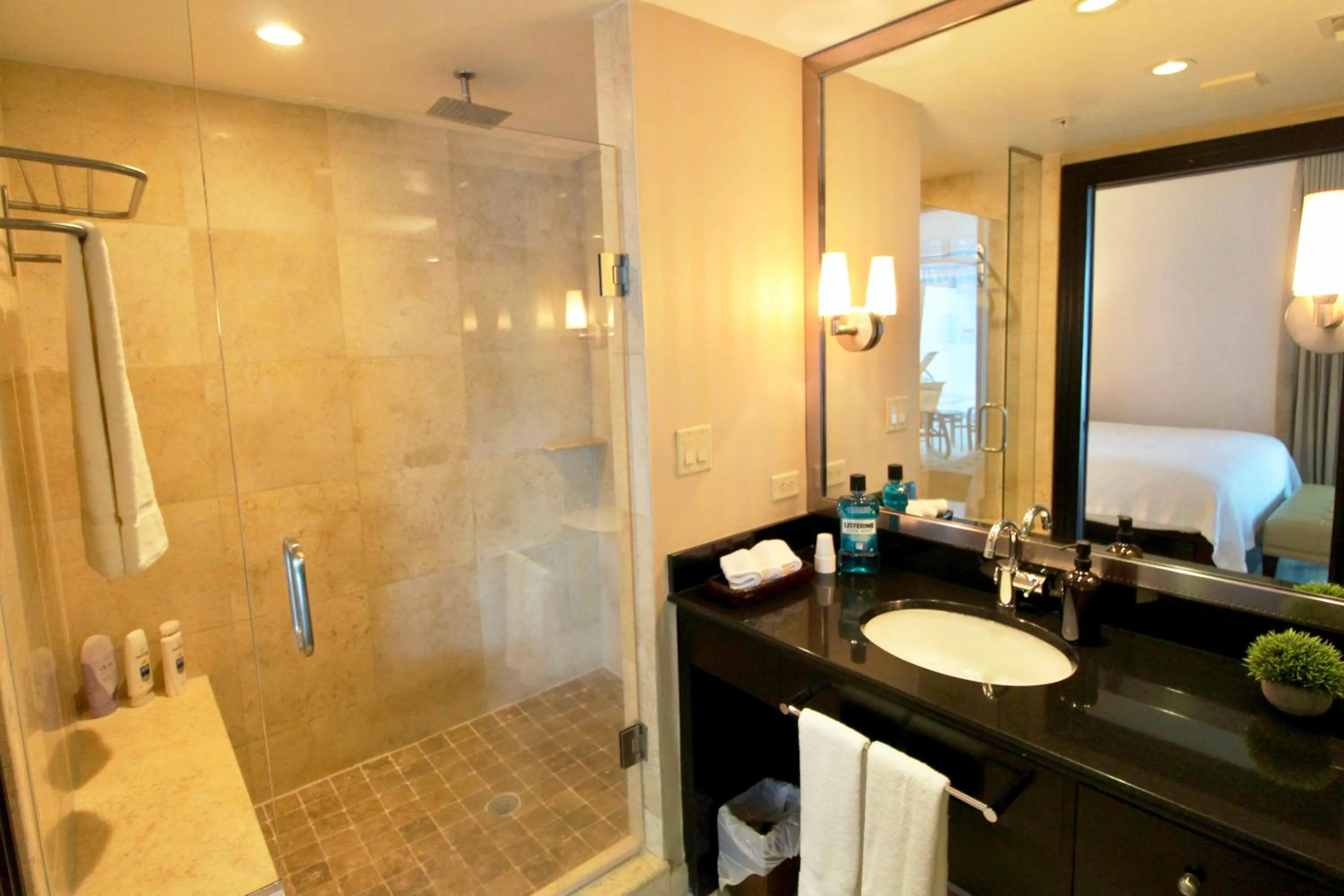 Shower in Boutique Suites 3 min walk to beach