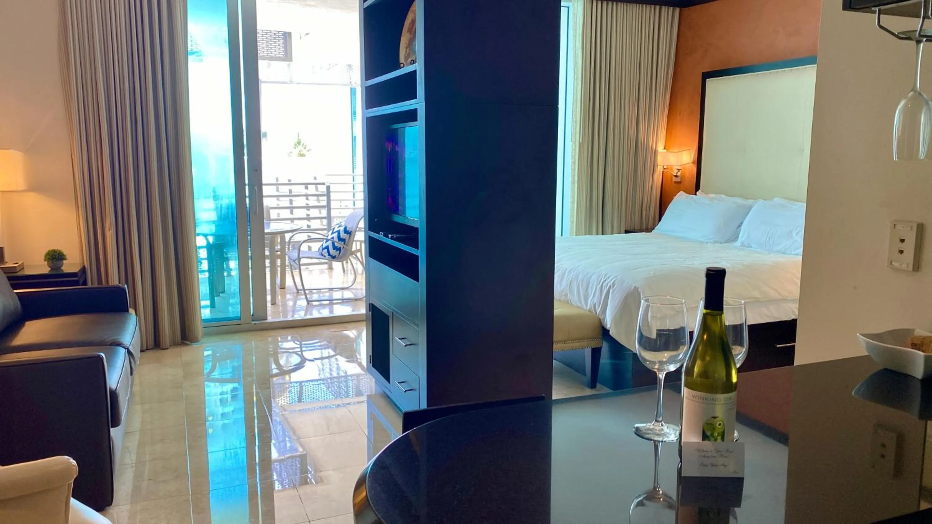 Photo of the whole room, Bed in Boutique Suites 3 min walk to beach