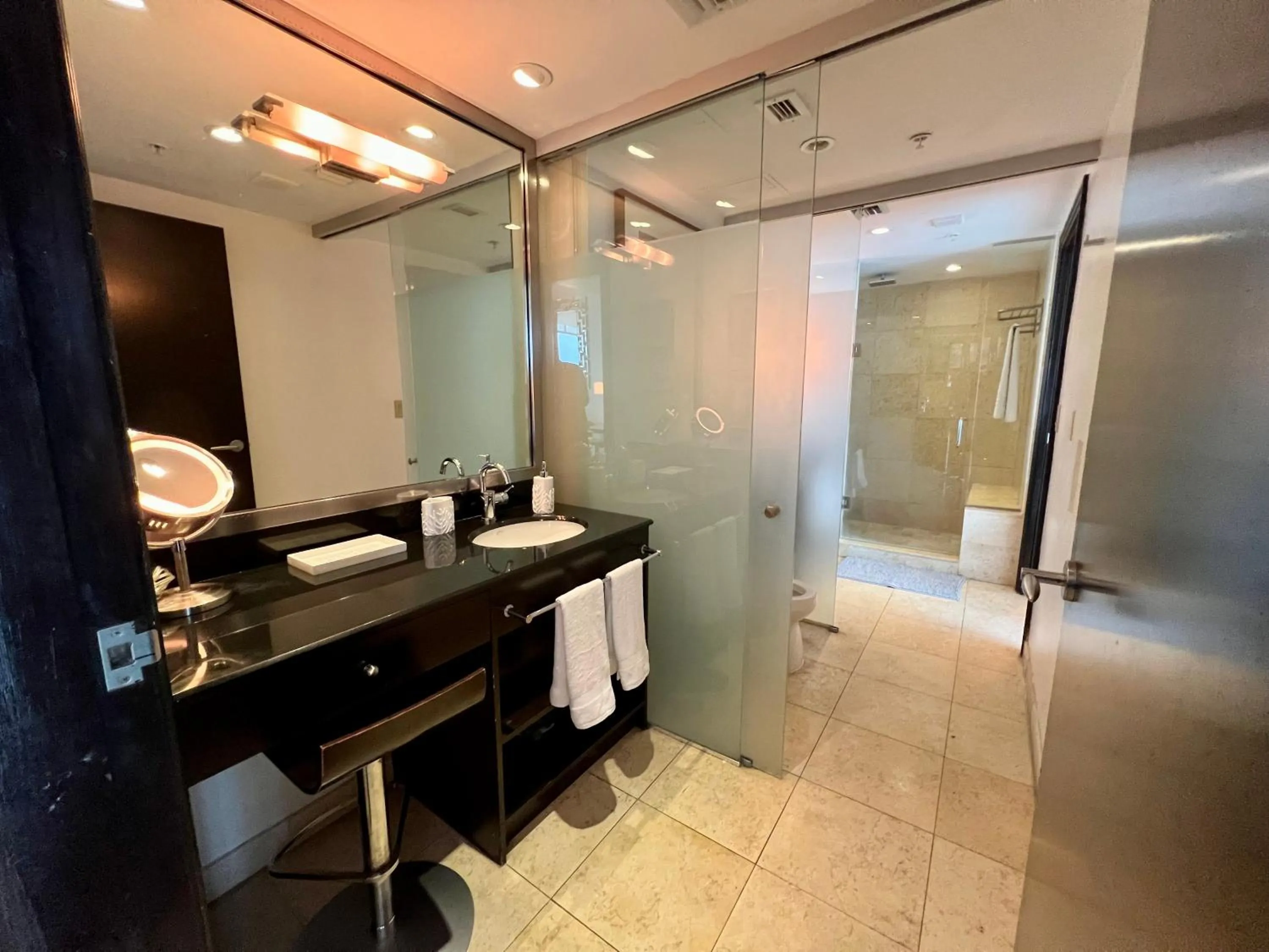 Shower in Boutique Suites 3 min walk to beach