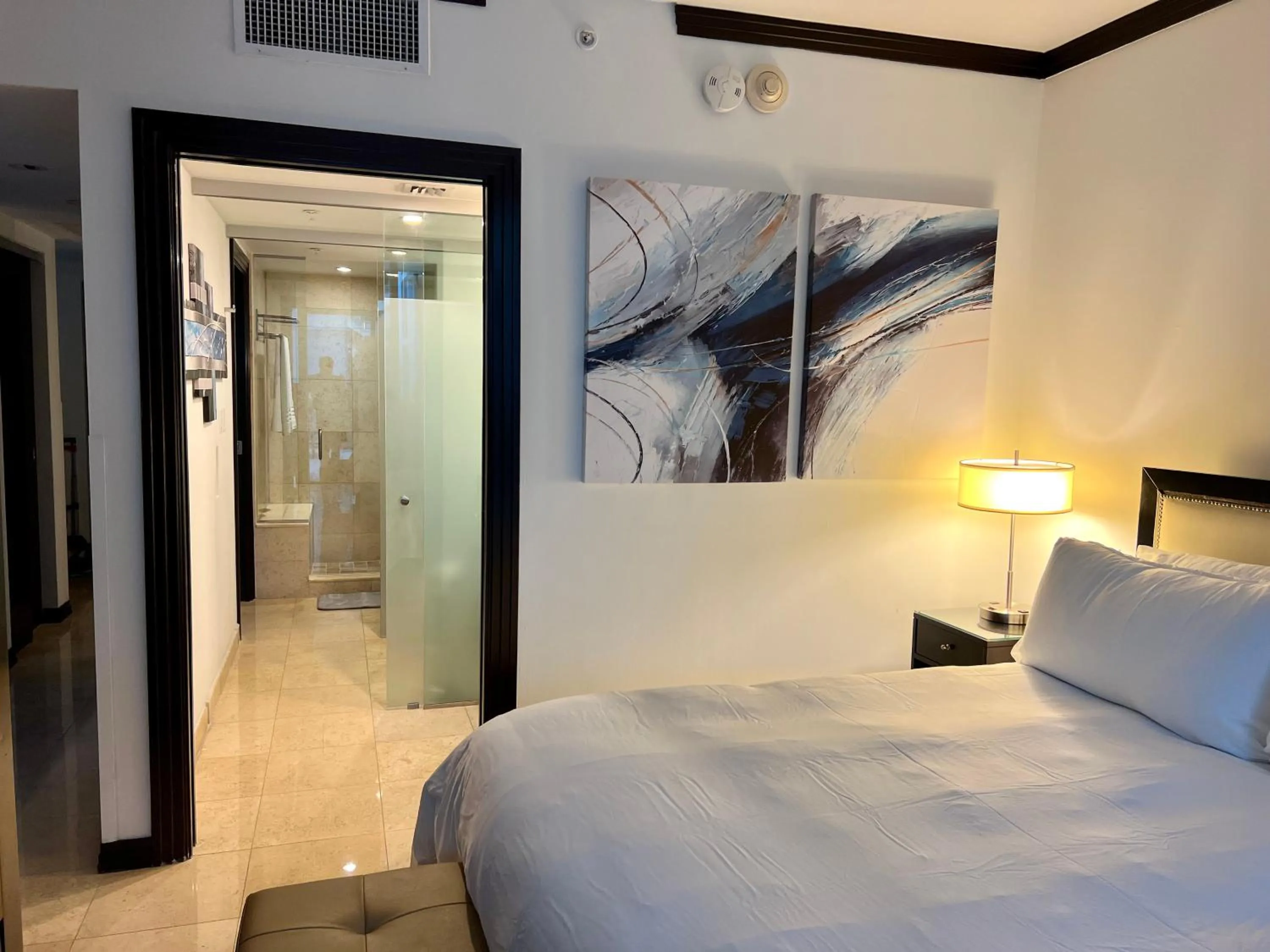 Photo of the whole room, Bed in Boutique Suites 3 min walk to beach