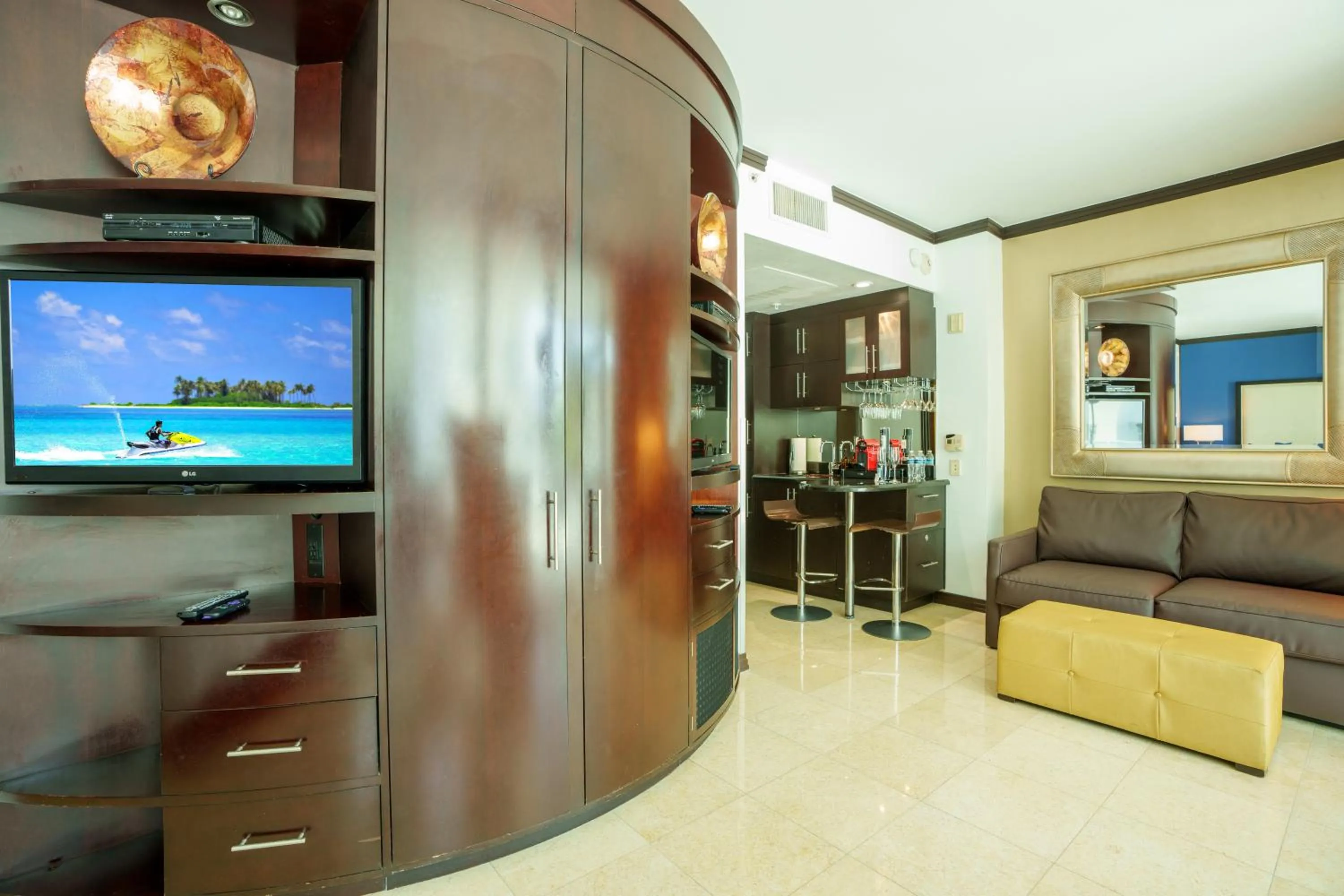 TV and multimedia in Boutique Suites 3 min walk to beach