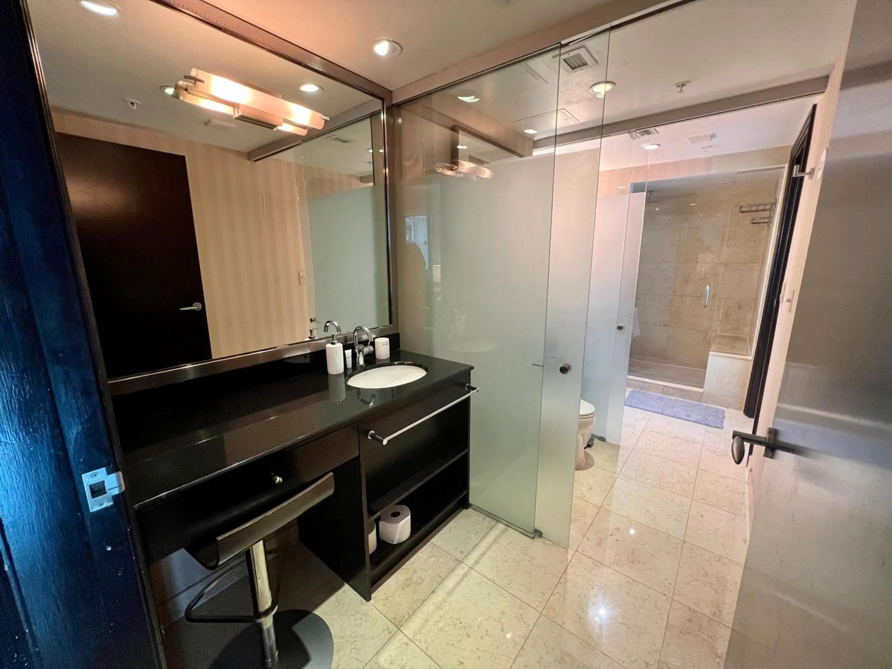 Shower in Boutique Suites 3 min walk to beach