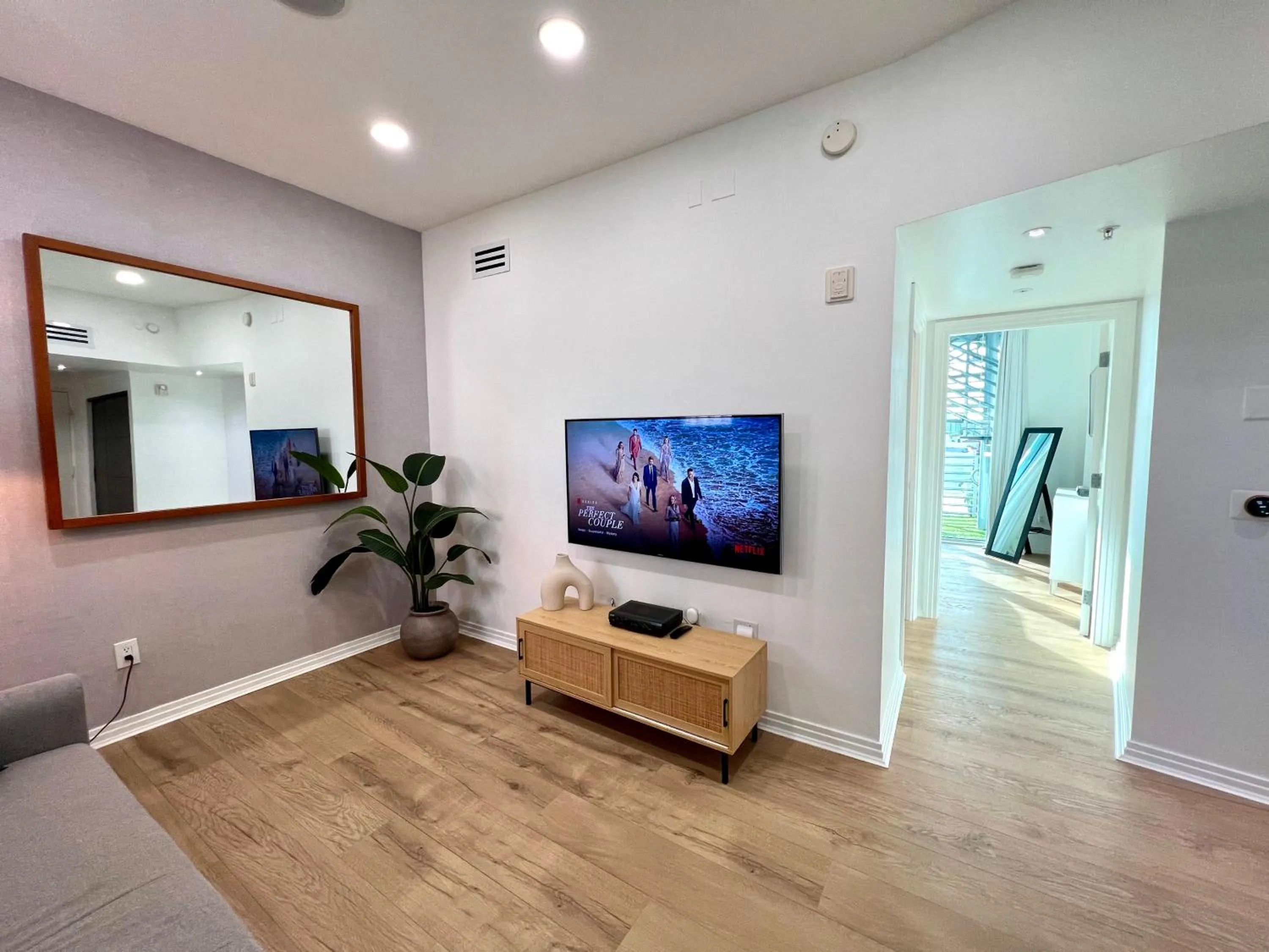 TV and multimedia in Boutique Suites 3 min walk to beach