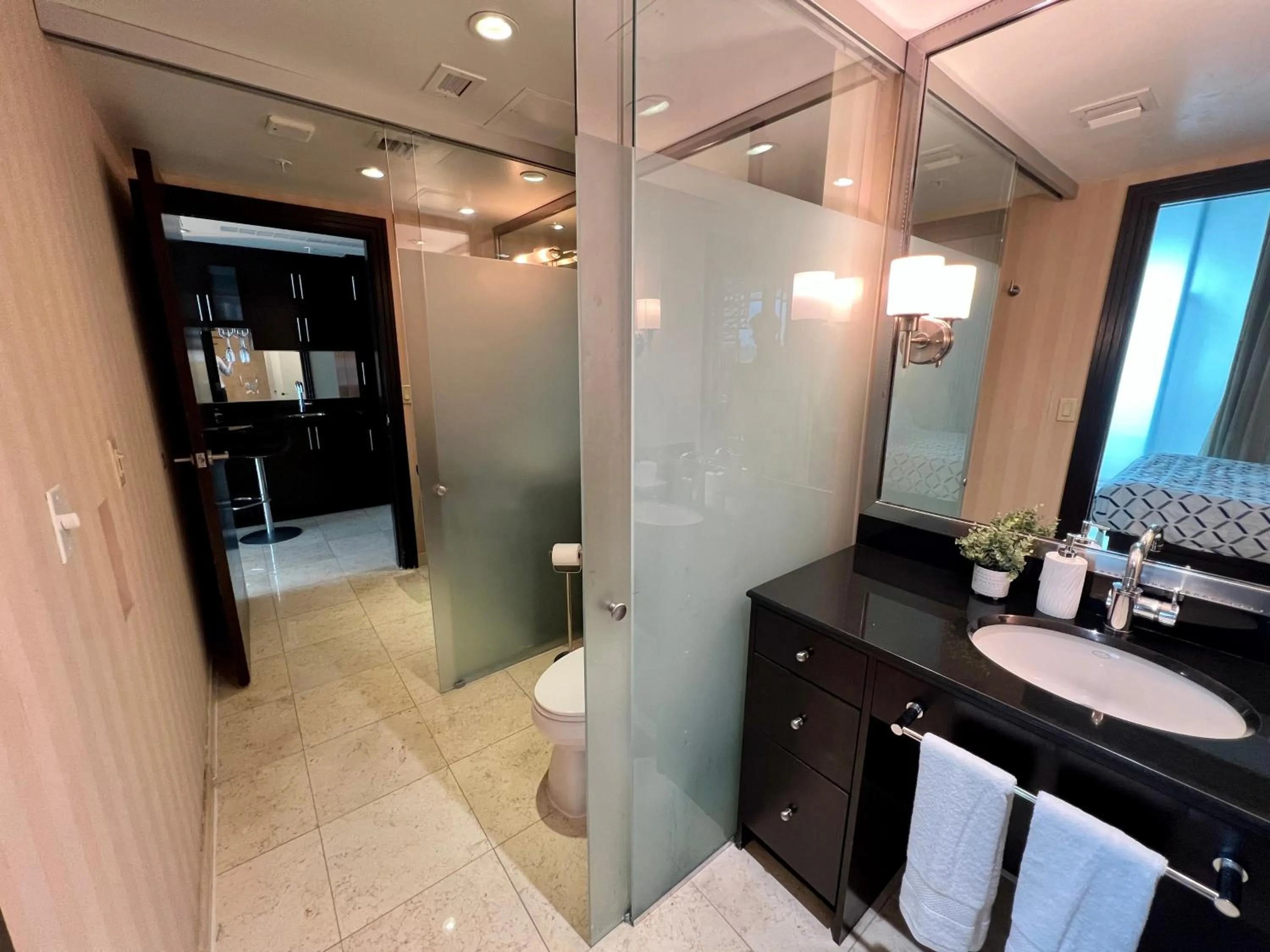 Shower in Boutique Suites 3 min walk to beach