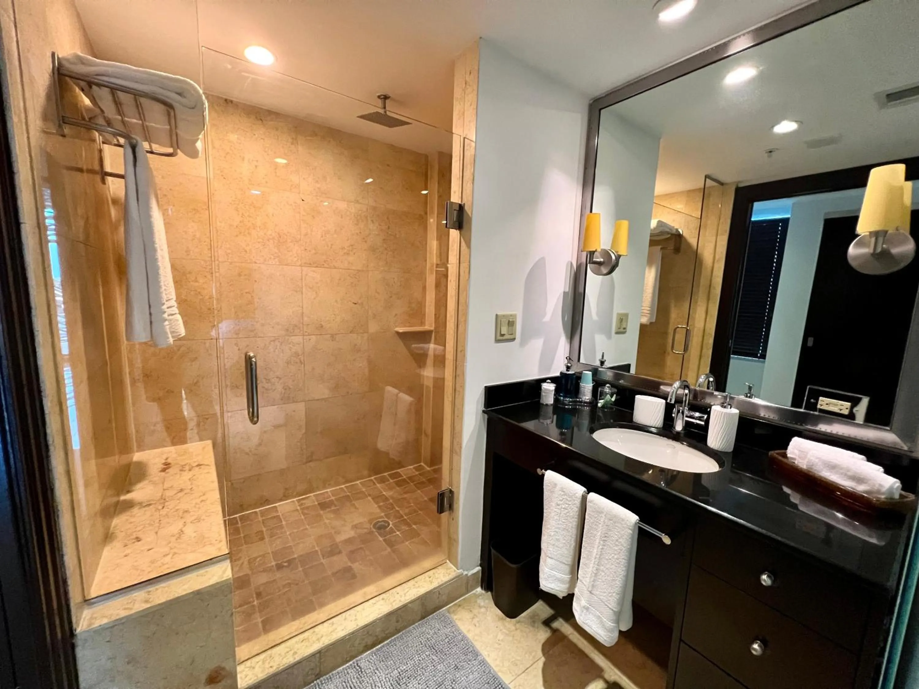 Shower in Boutique Suites 3 min walk to beach