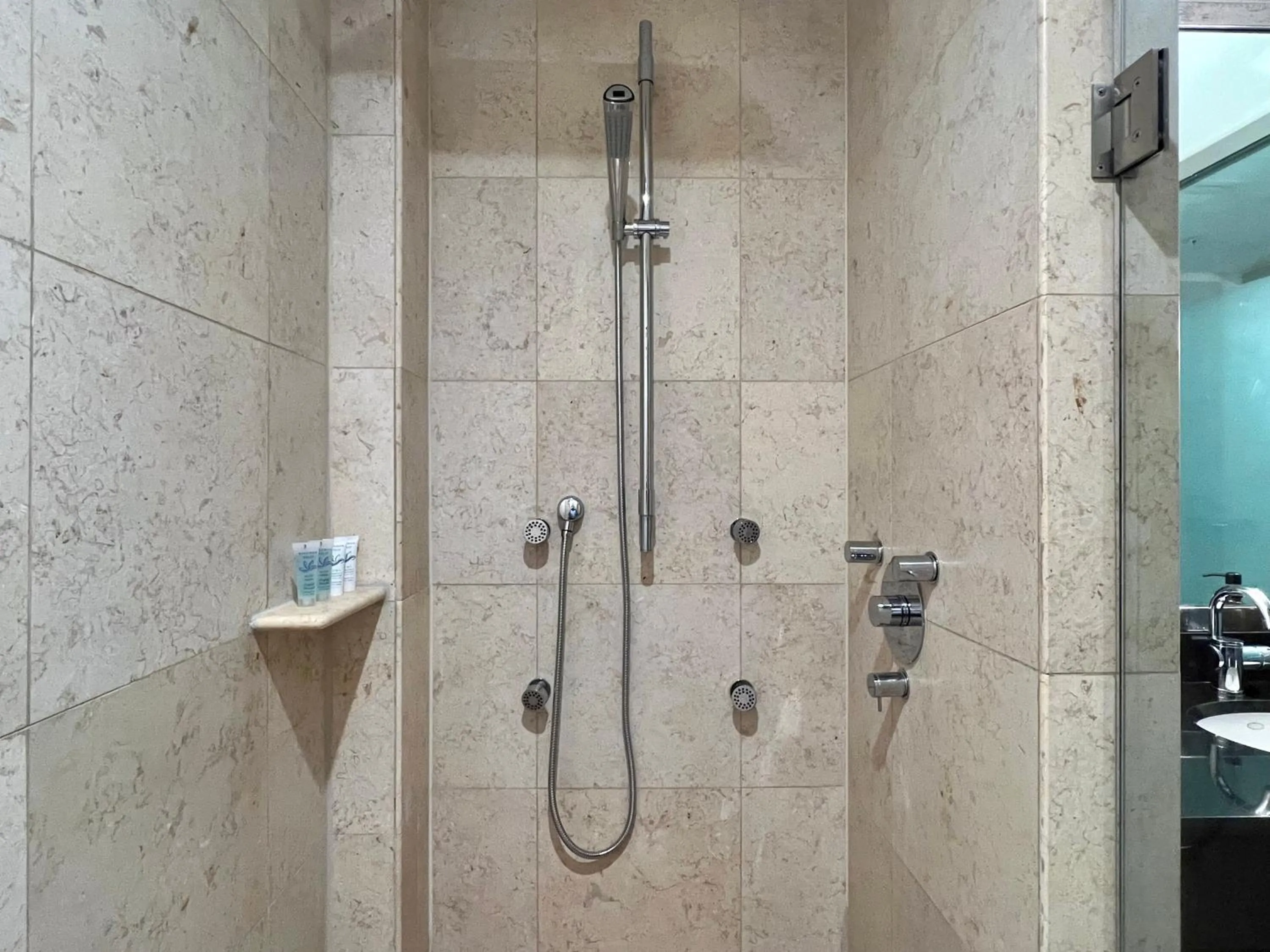 Shower in Boutique Suites 3 min walk to beach