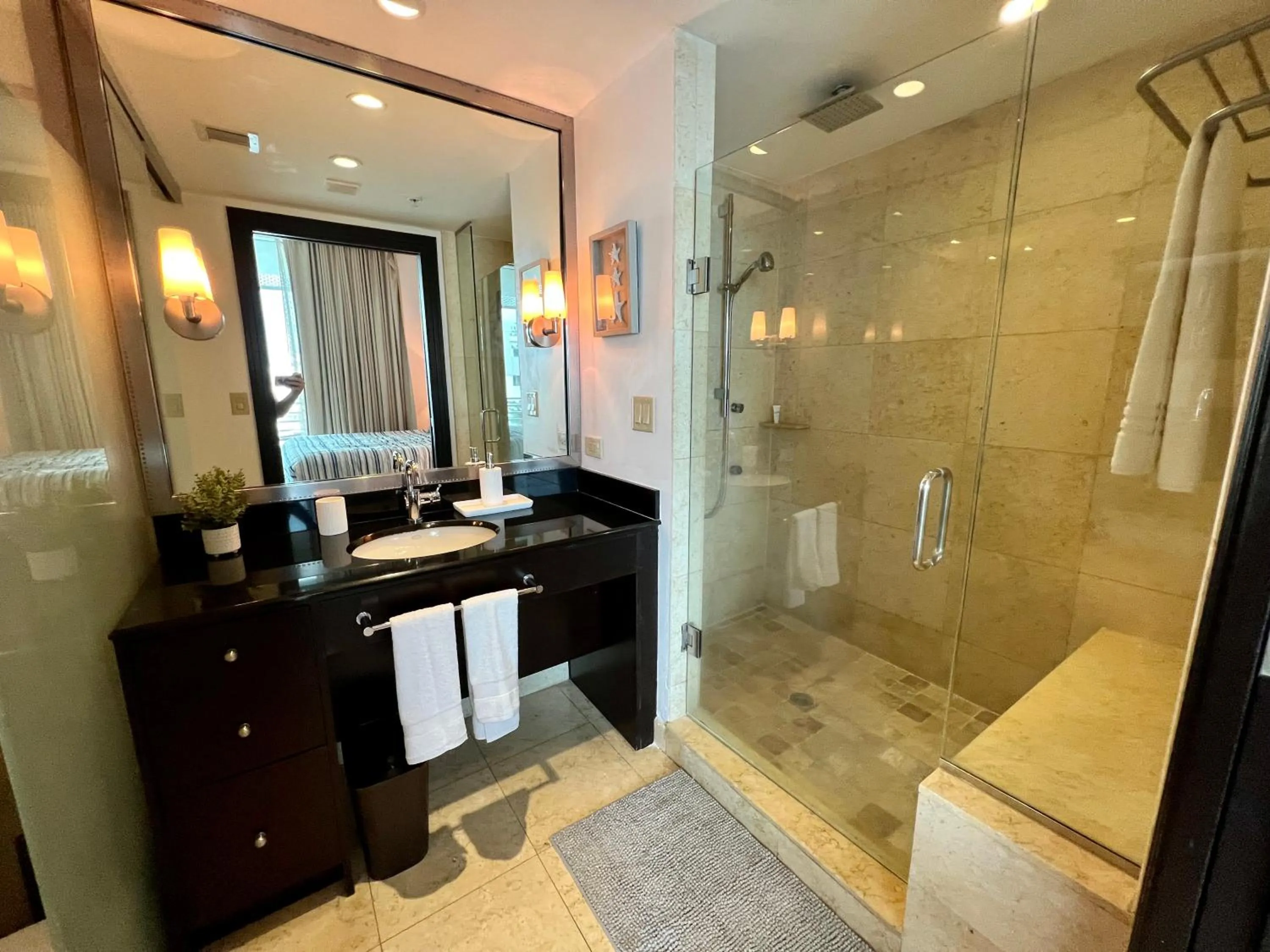 Shower in Boutique Suites 3 min walk to beach