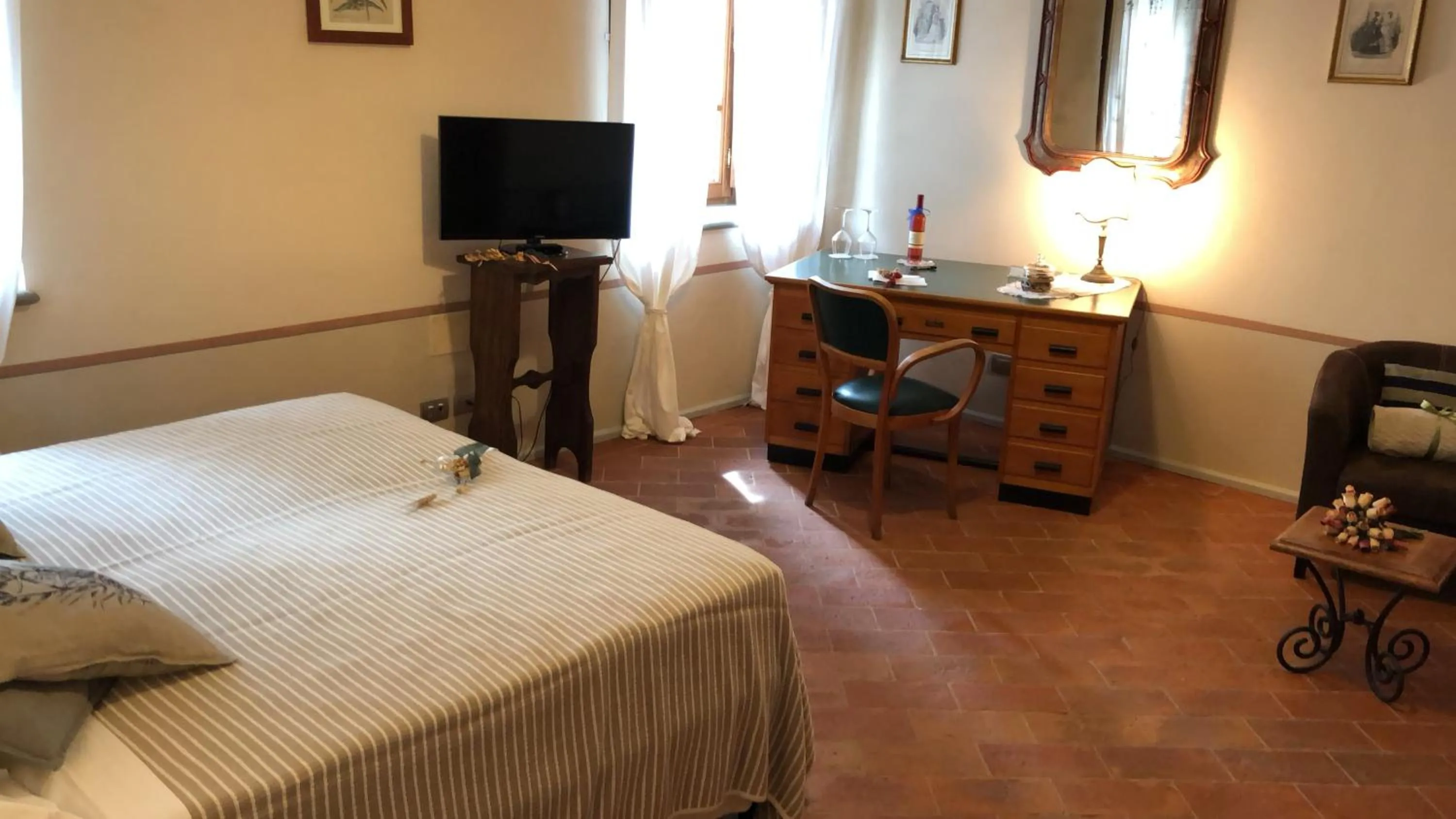 Bed in La Cantina Relais - Fattoria Il Cipresso