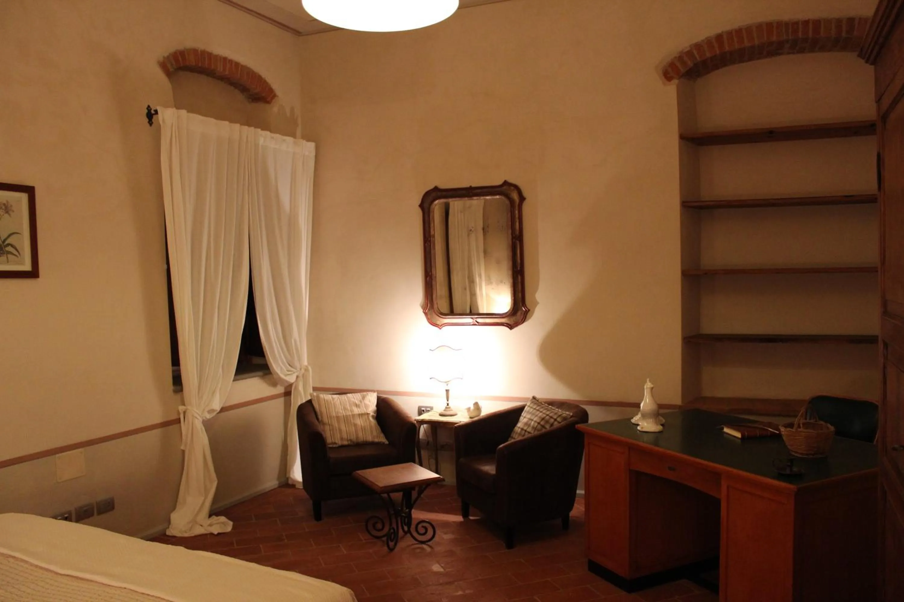 Living room, Bed in La Cantina Relais - Fattoria Il Cipresso