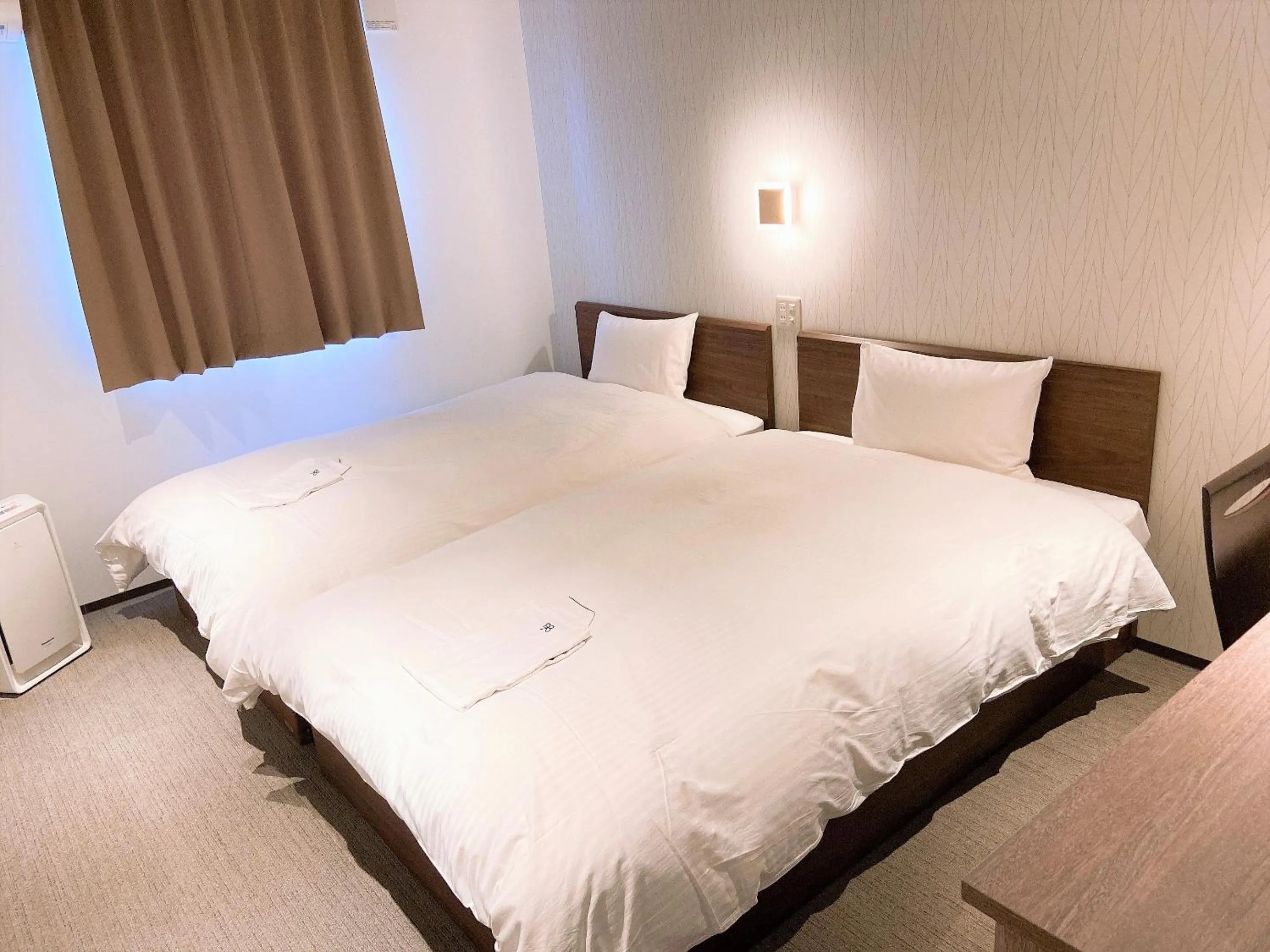 Bed in Hotel chez toi Kanonji