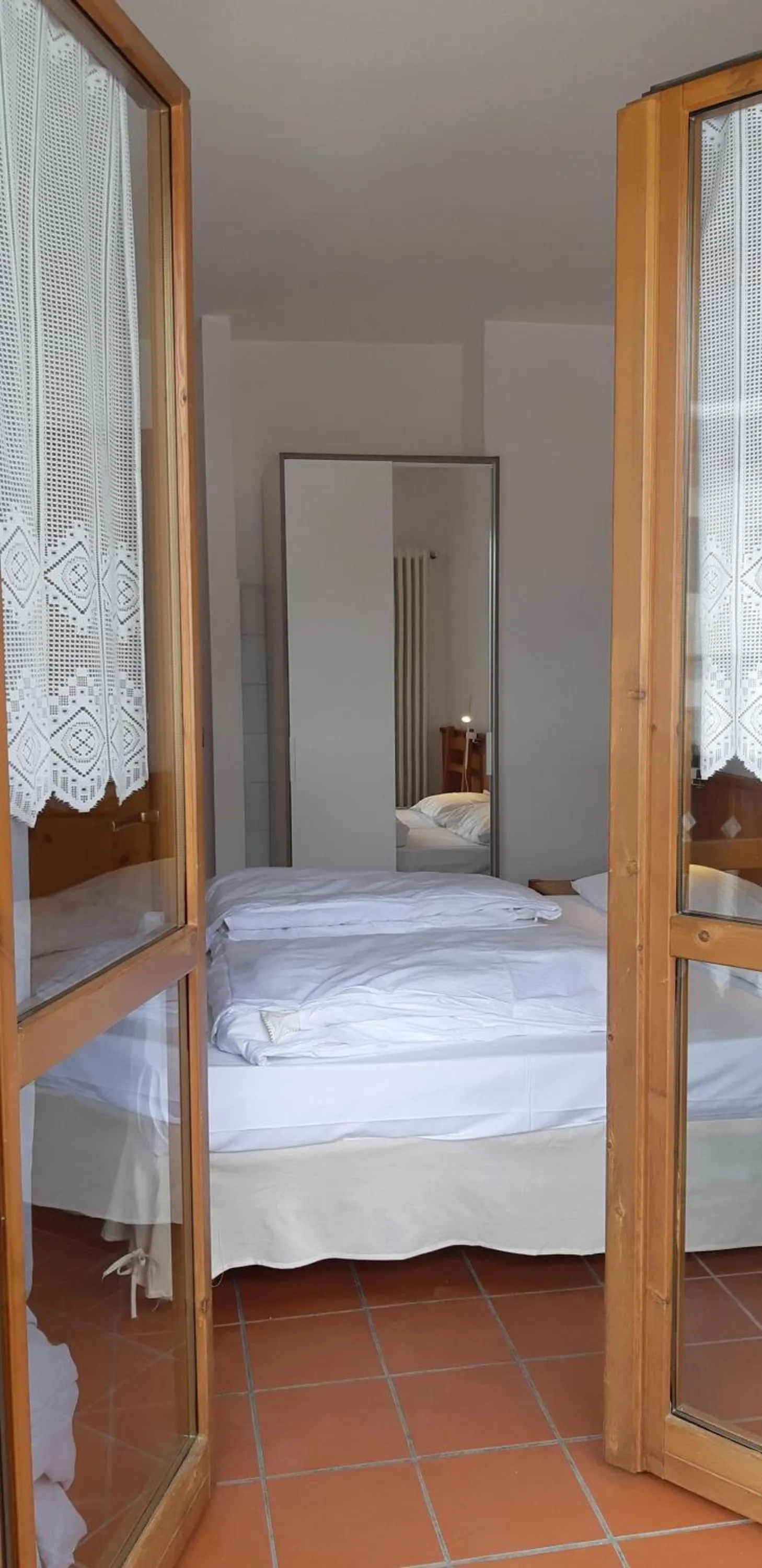 Photo of the whole room, Bed in Residence Weissthor