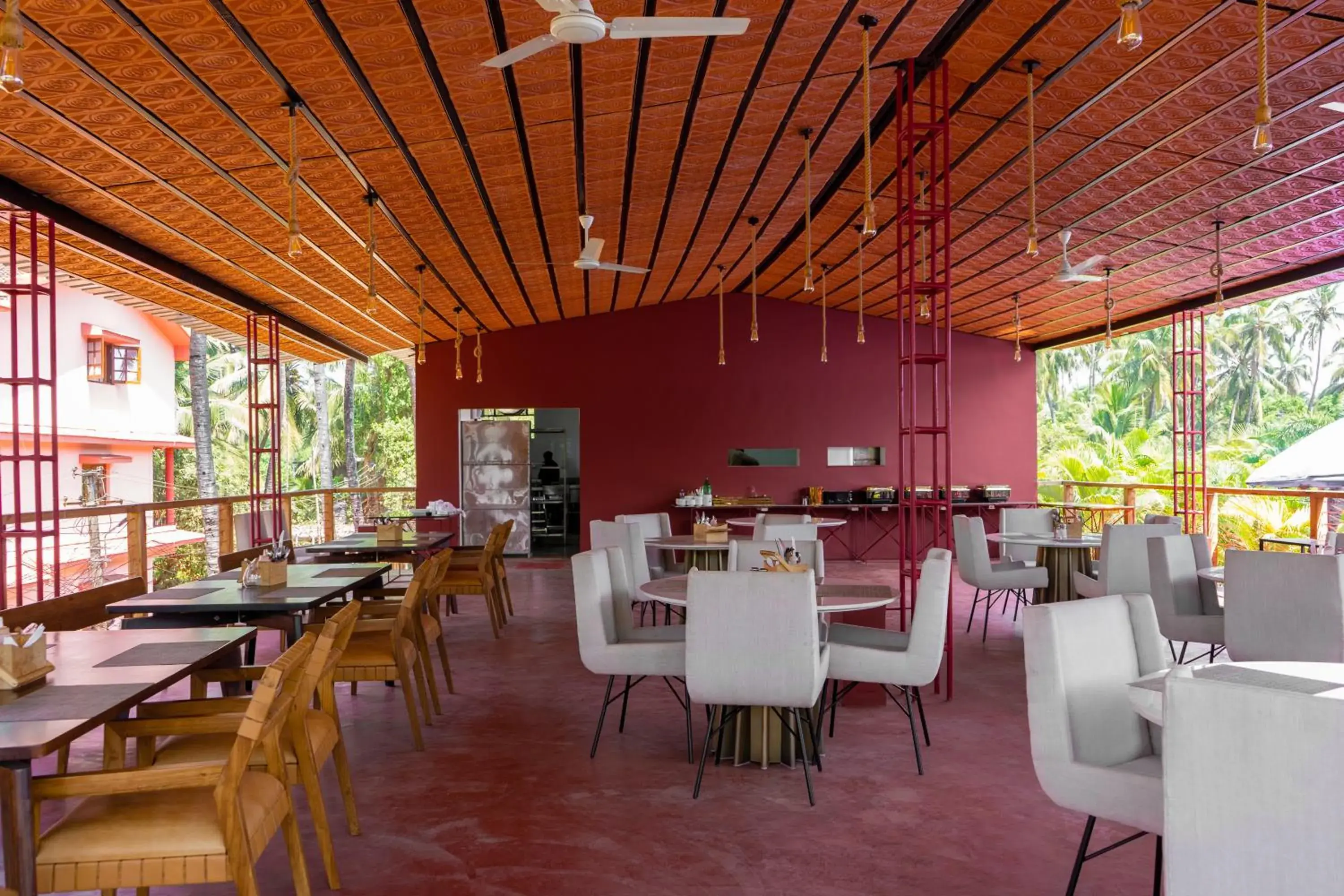 Lounge or bar in juSTa Morjim Beach Resort Goa - 80 Steps from Morjim Beach Lounge or bar in juSTa Morjim Beach Resort Goa - 80 Steps from Morjim Beach