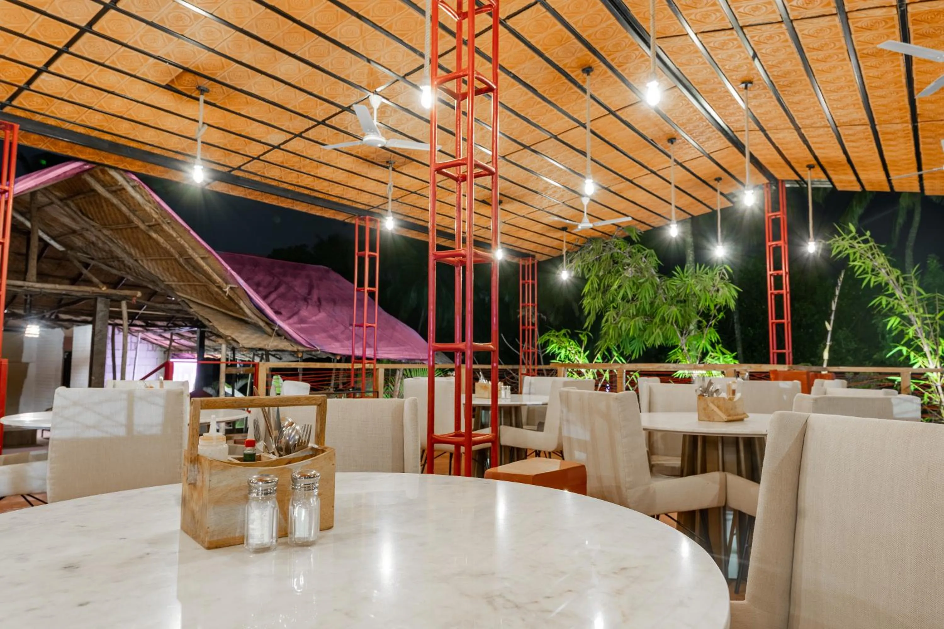 Lounge or bar in juSTa Morjim Beach Resort Goa - 80 Steps from Morjim Beach