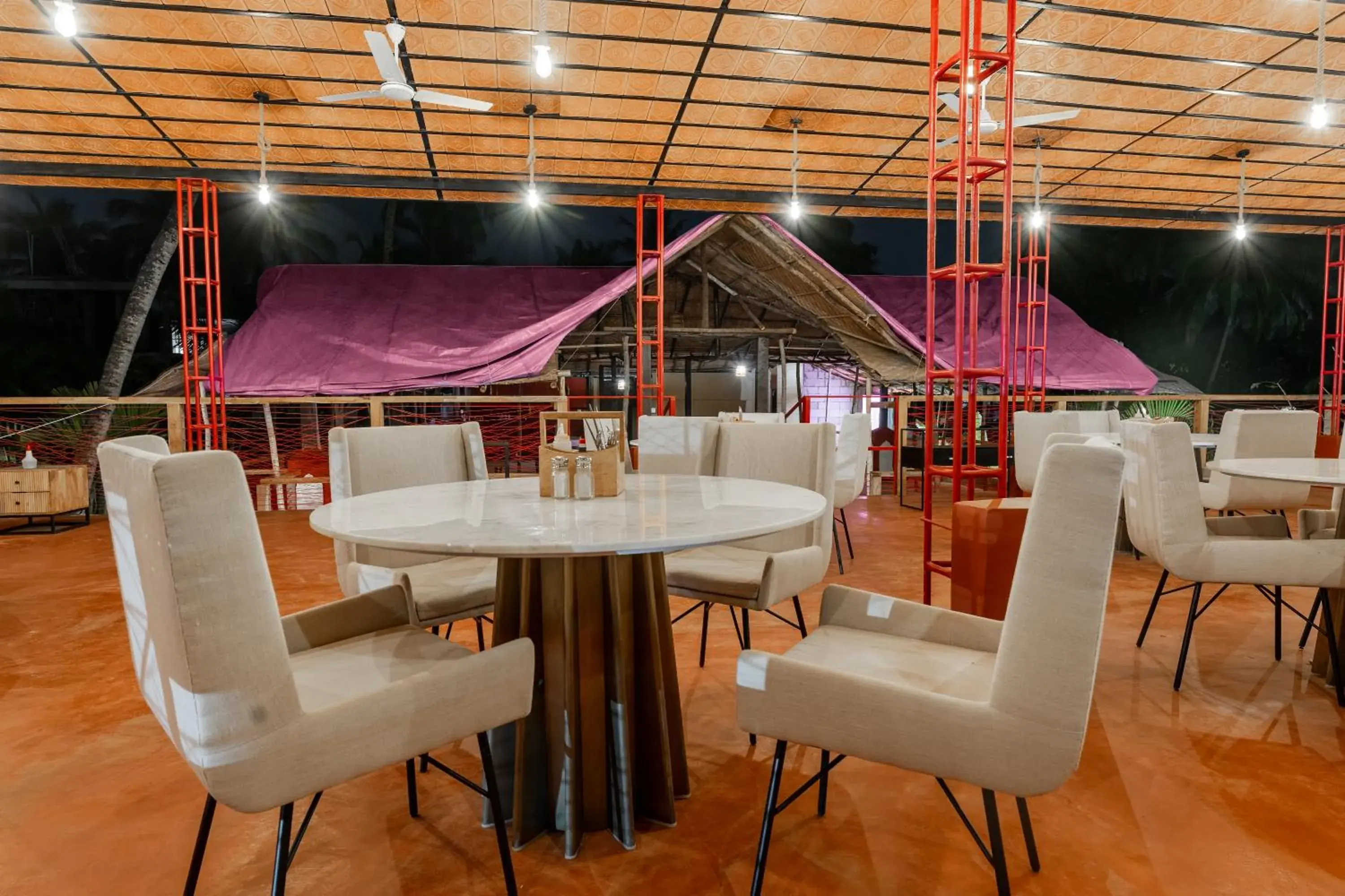 Lounge or bar in juSTa Morjim Beach Resort Goa - 80 Steps from Morjim Beach Lounge or bar in juSTa Morjim Beach Resort Goa - 80 Steps from Morjim Beach