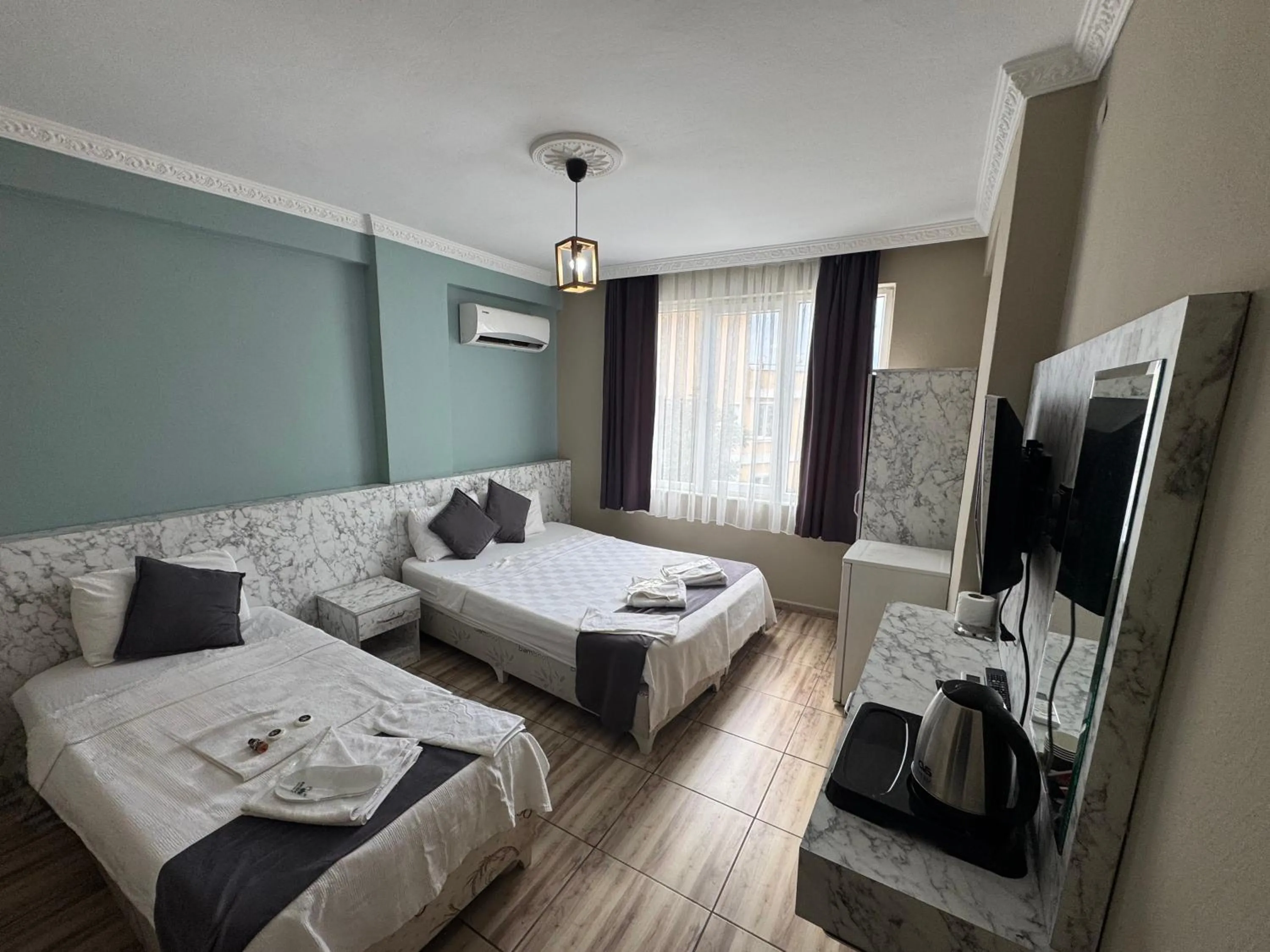 Bed in ERSOY EGE APART OTEL