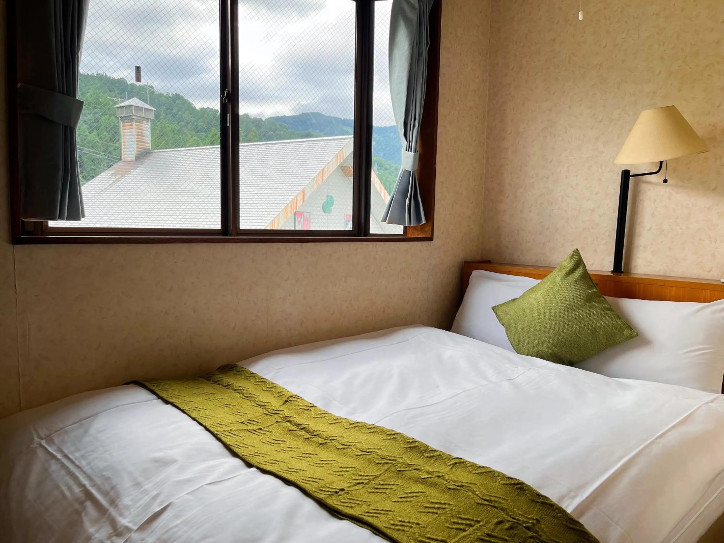 Bedroom, Bed in Yuzawa Hotel New Fukudaya-ski in ski out