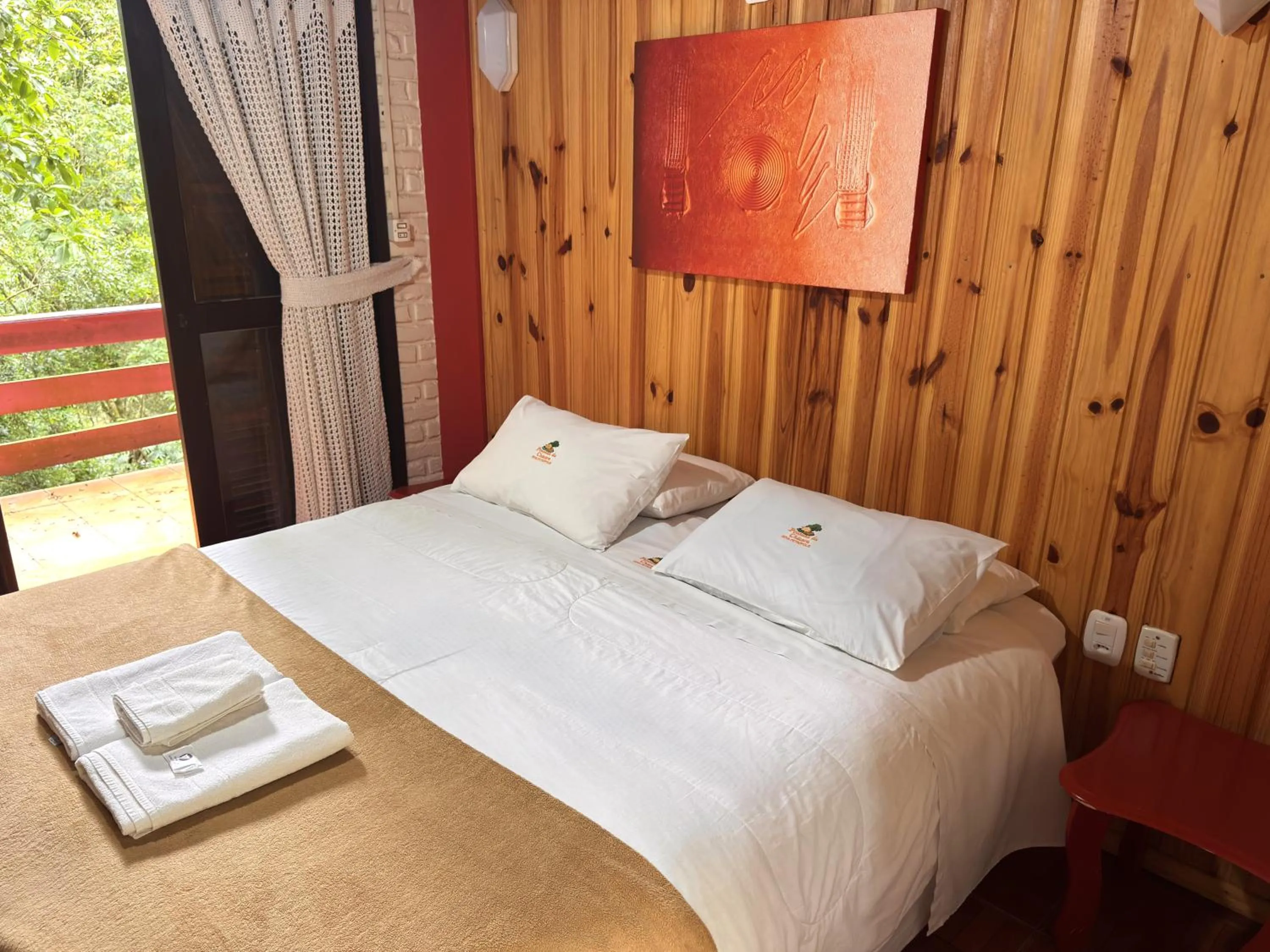 Bed in Pousada da Chacara