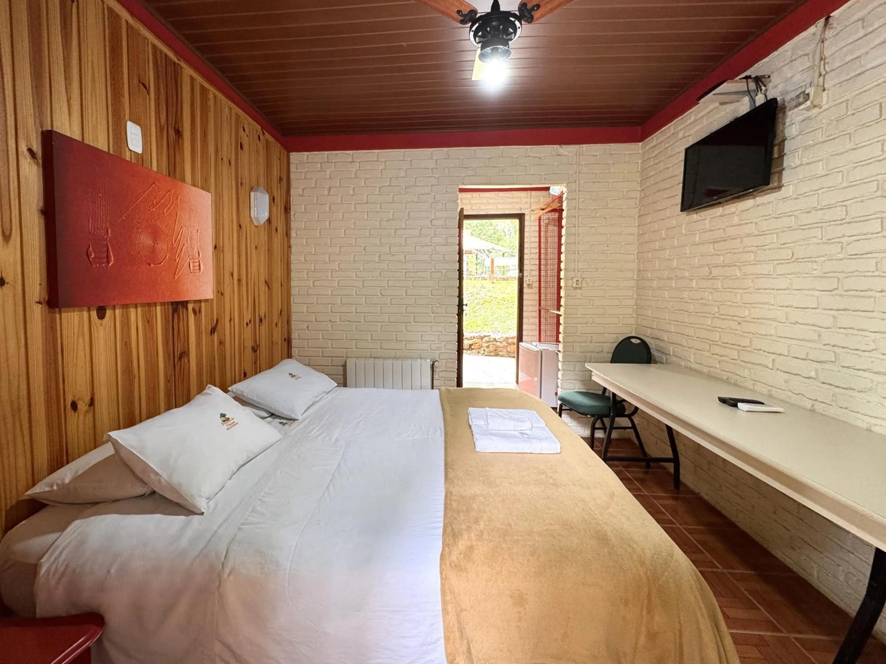 Bed in Pousada da Chacara