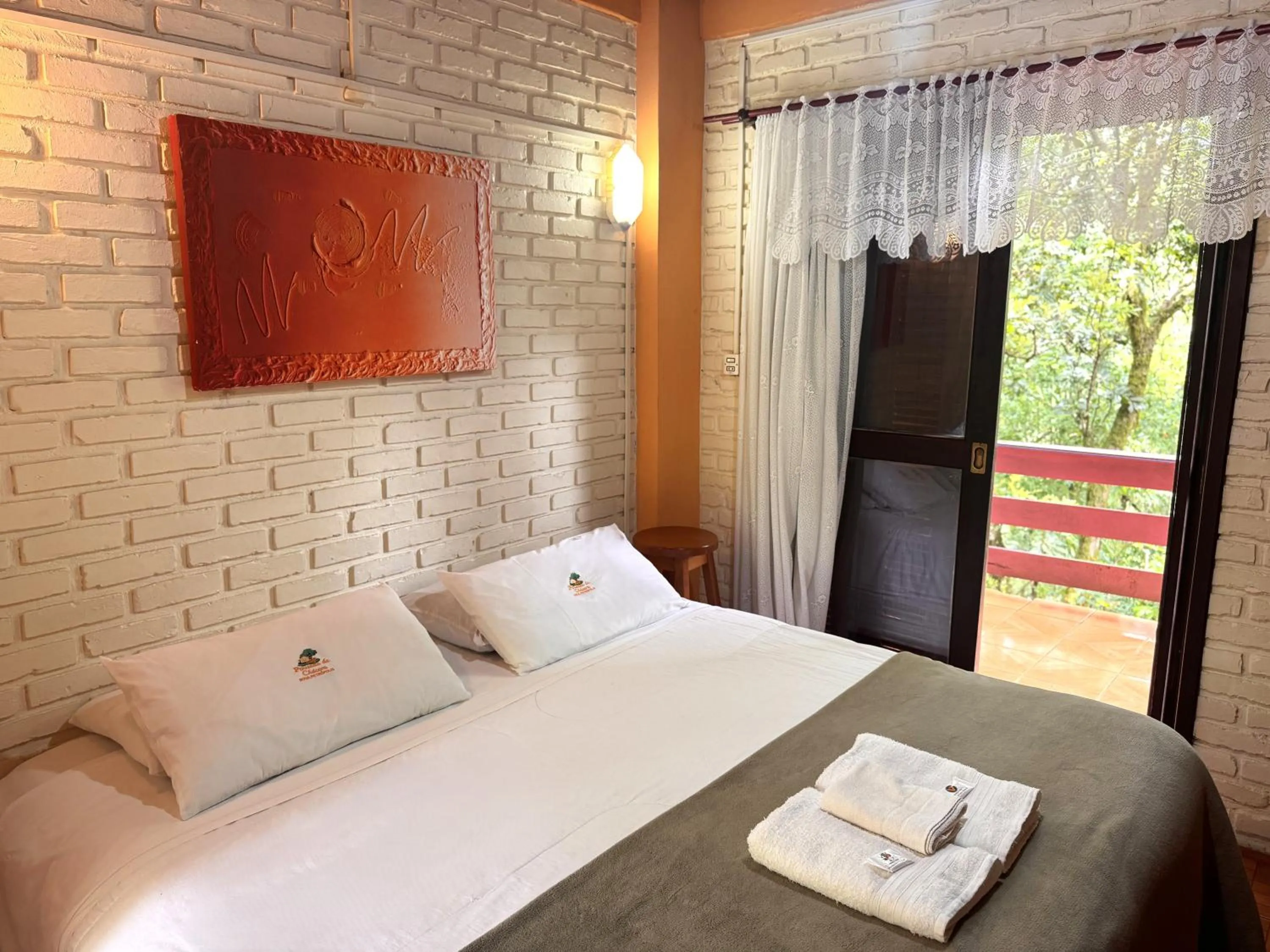 Bed in Pousada da Chacara